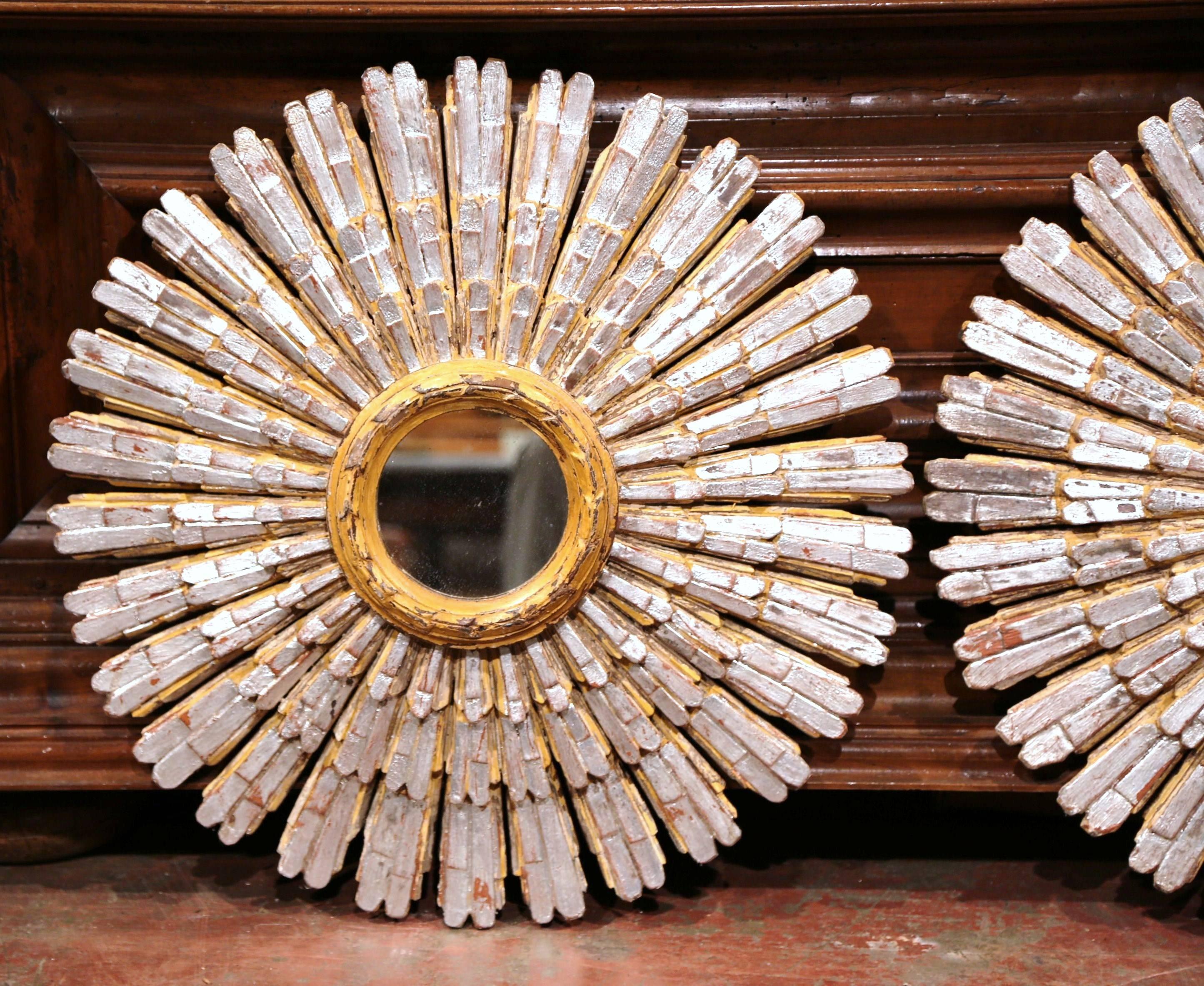 Patinated Pair of Mid-20th Century French Carved Painted and Silvered Sunburst Mirrors