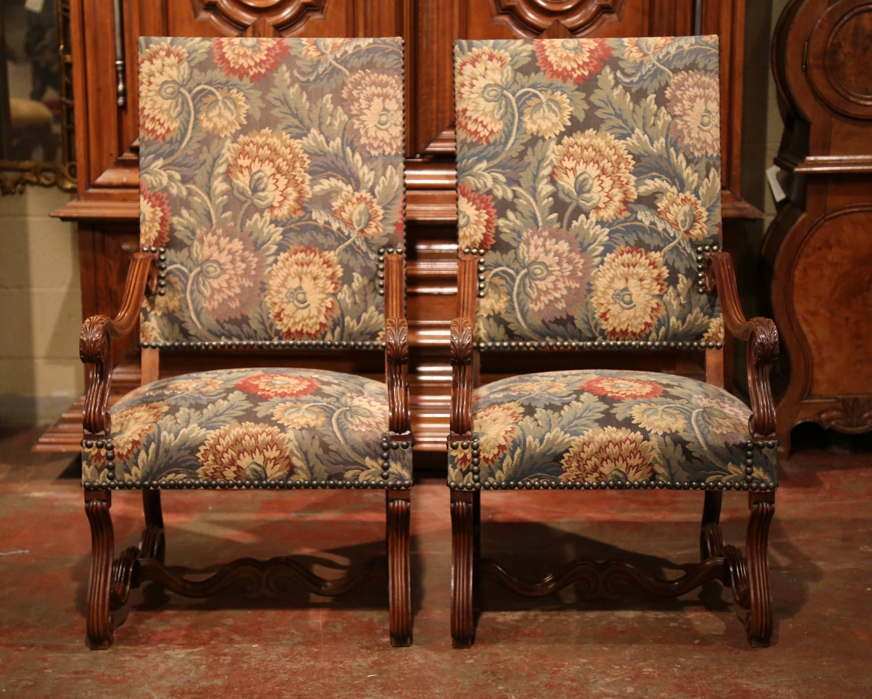 Tall Pair of 19th Century French Louis XIII Carved Walnut Upholstered Armchairs In Excellent Condition In Dallas, TX