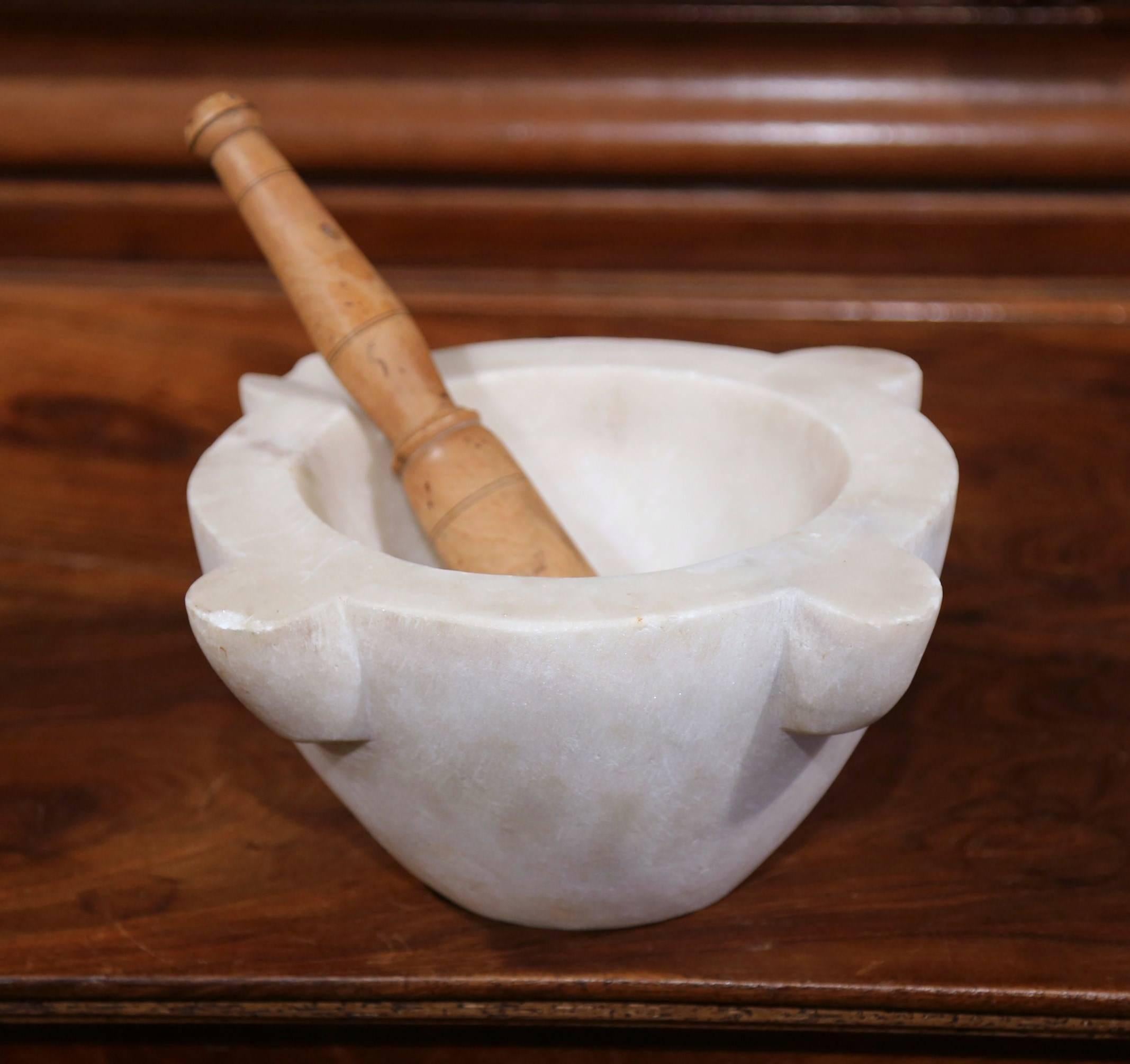 Grind spices in your kitchen with this beautifully carved, antique white marble mortar from France, circa 1860. Round in shape, the set has its original turned walnut pestle. Excellent condition with rich patina.
Measures: 12”diameter x 5.5” height.