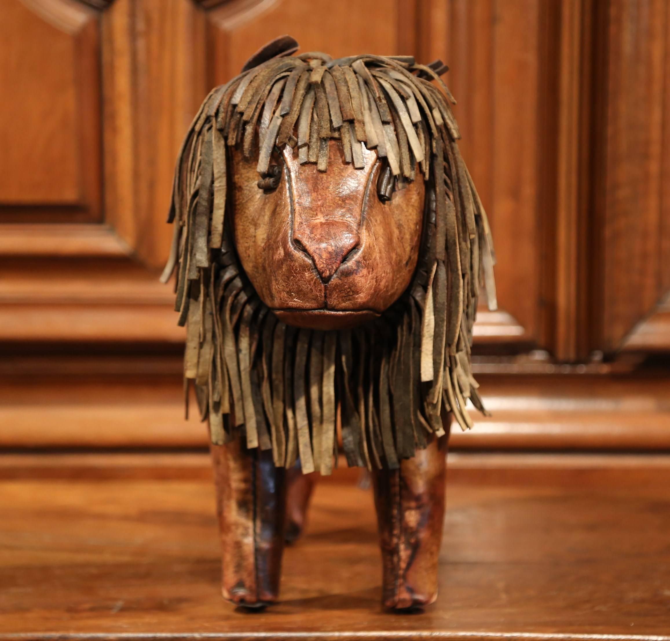 Patinated 19th century English Foot Stool Lion Sculpture with Original Brown Leather