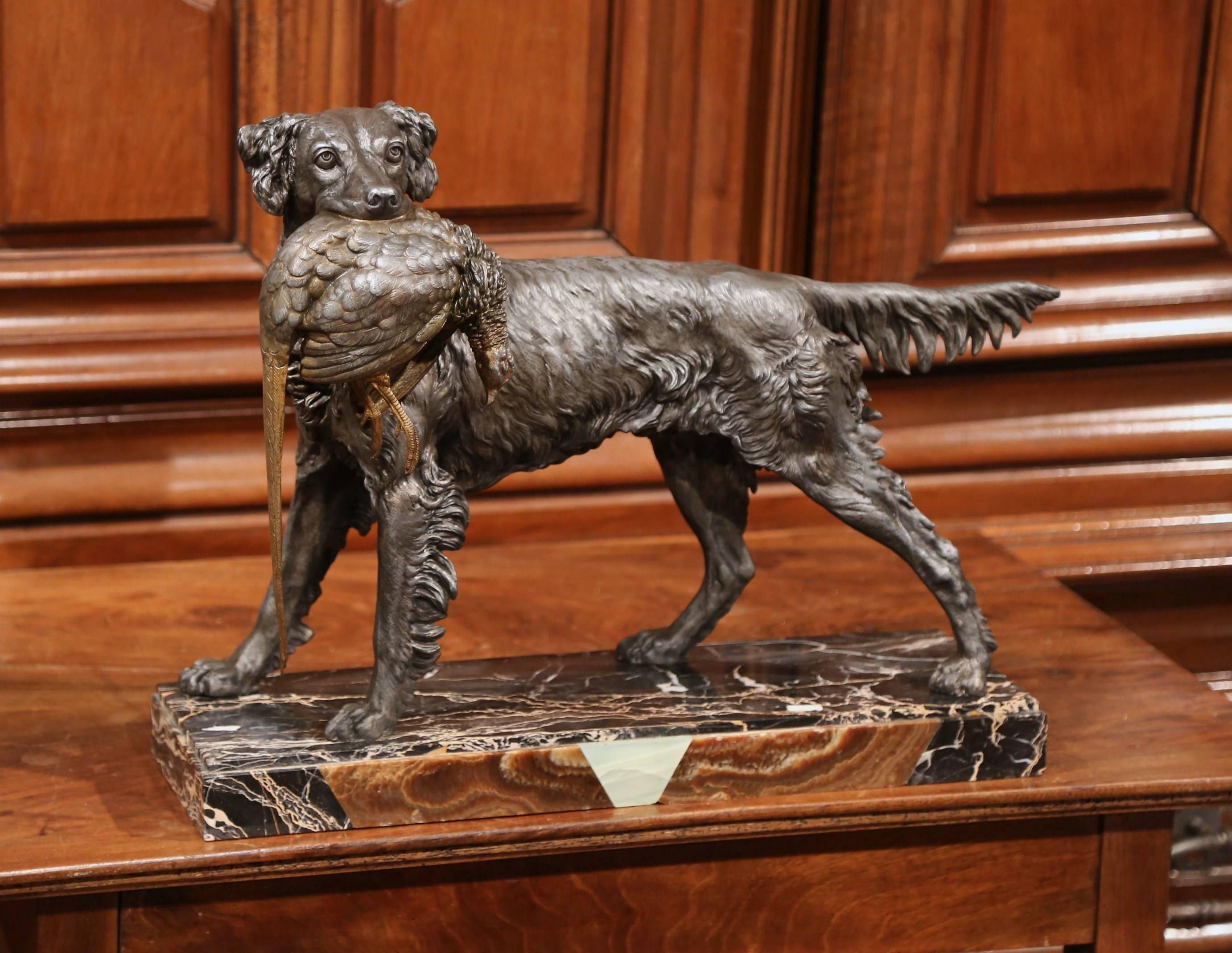 Decorate your study or mantel with this impressive and beautifully executed setter with pheasant sculpture from France, circa 1870. In the style of French sculptor Jules Moigniez, the expressive dog figure is seen hunting and holds a bird in his