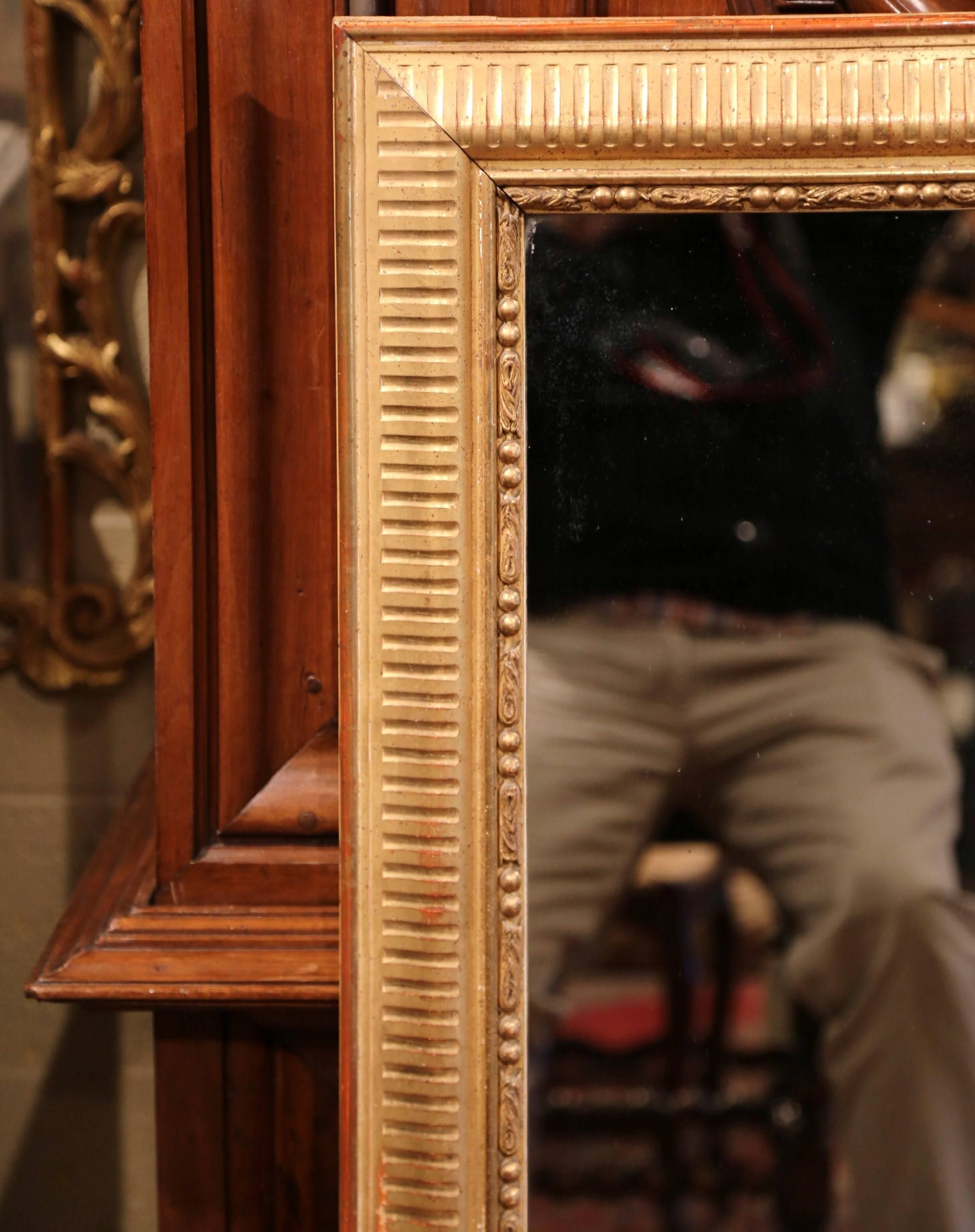 Patinated 19th Century French Louis XVI Carved Gold Leaf Mirror with Two-Tone Stripe Motif