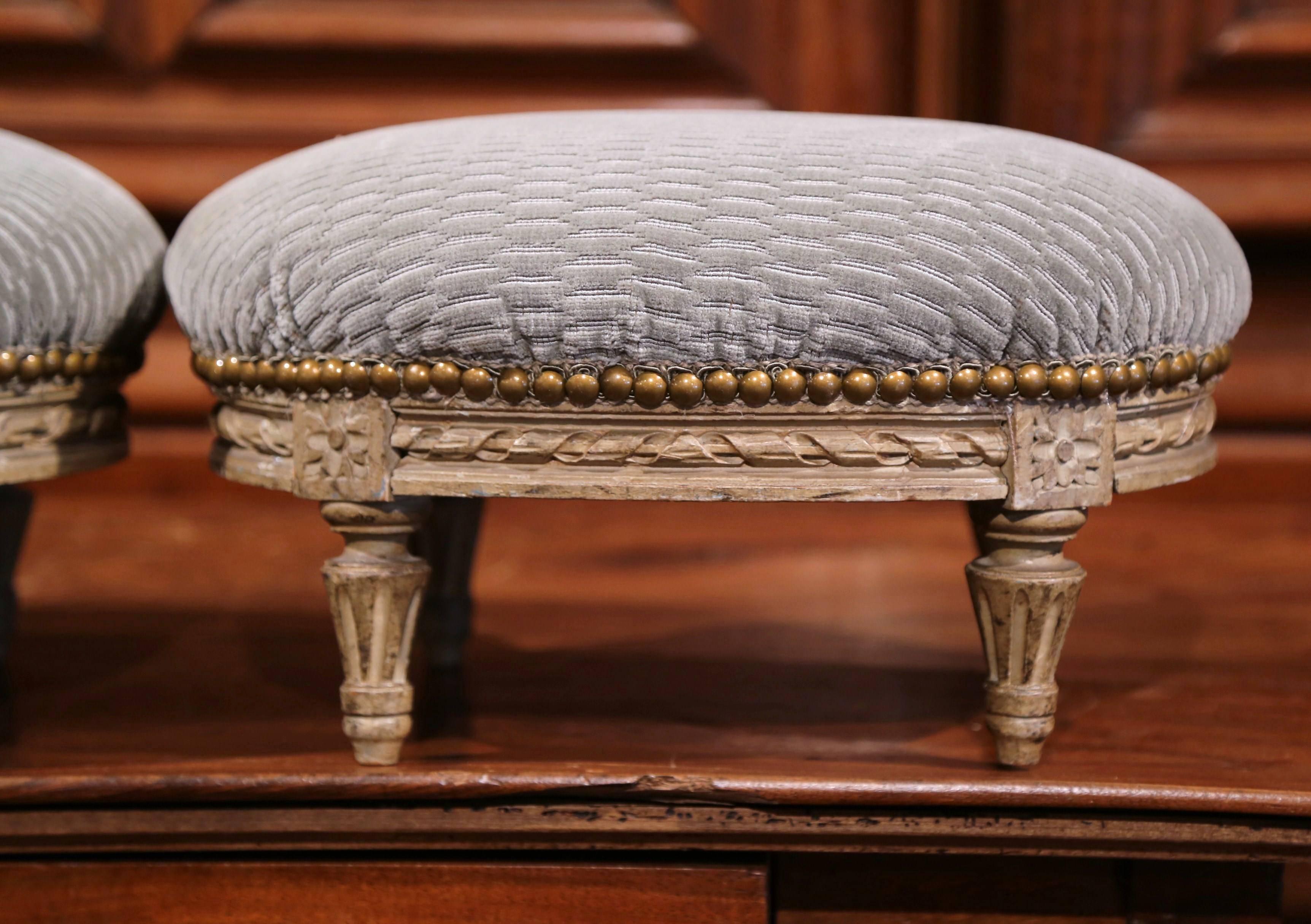 Pair of French Louis XVI Carved Painted Oval Footstools with Blue Velvet Fabric In Excellent Condition In Dallas, TX