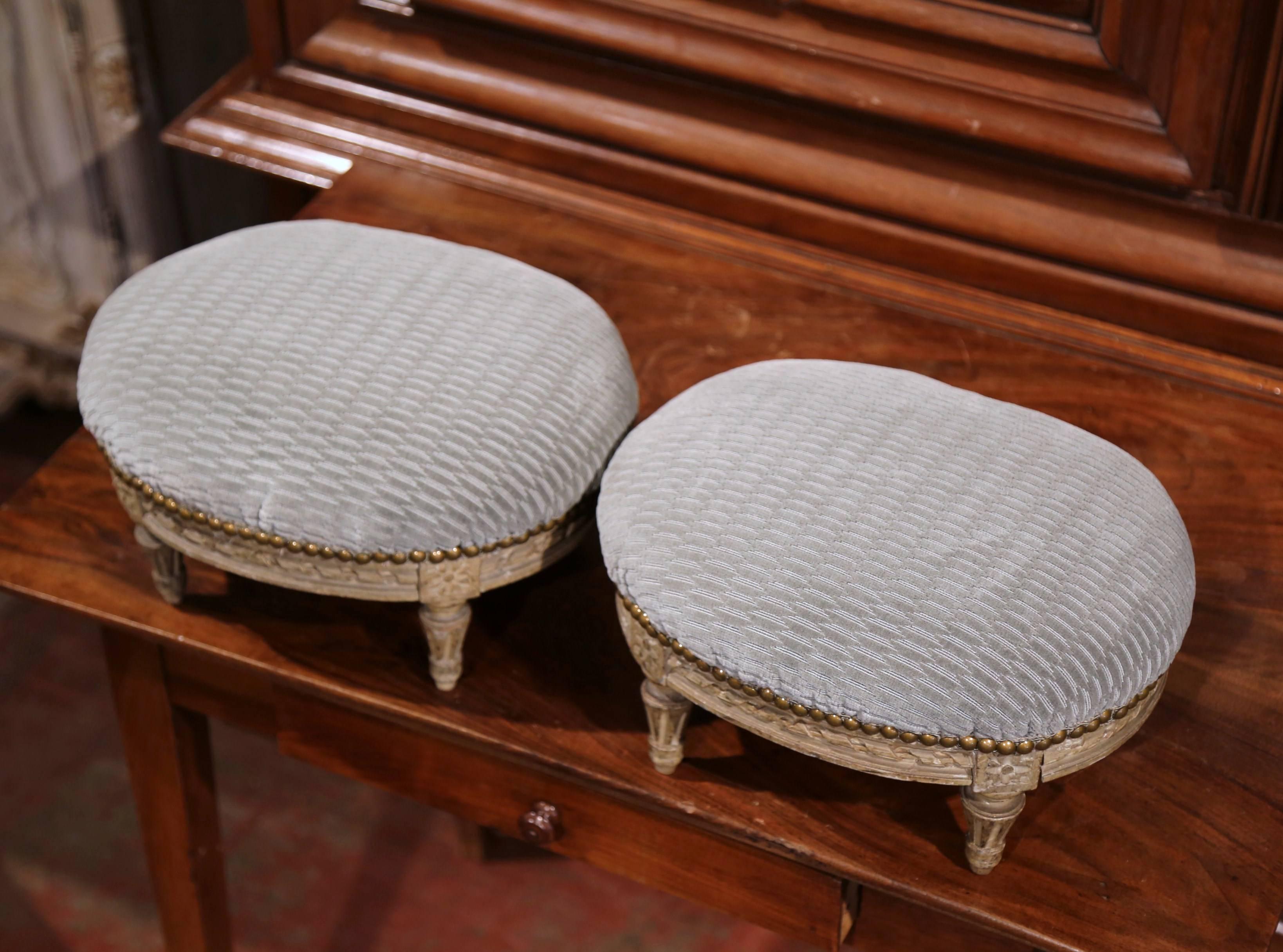 Pair of French Louis XVI Carved Painted Oval Footstools with Blue Velvet Fabric 1