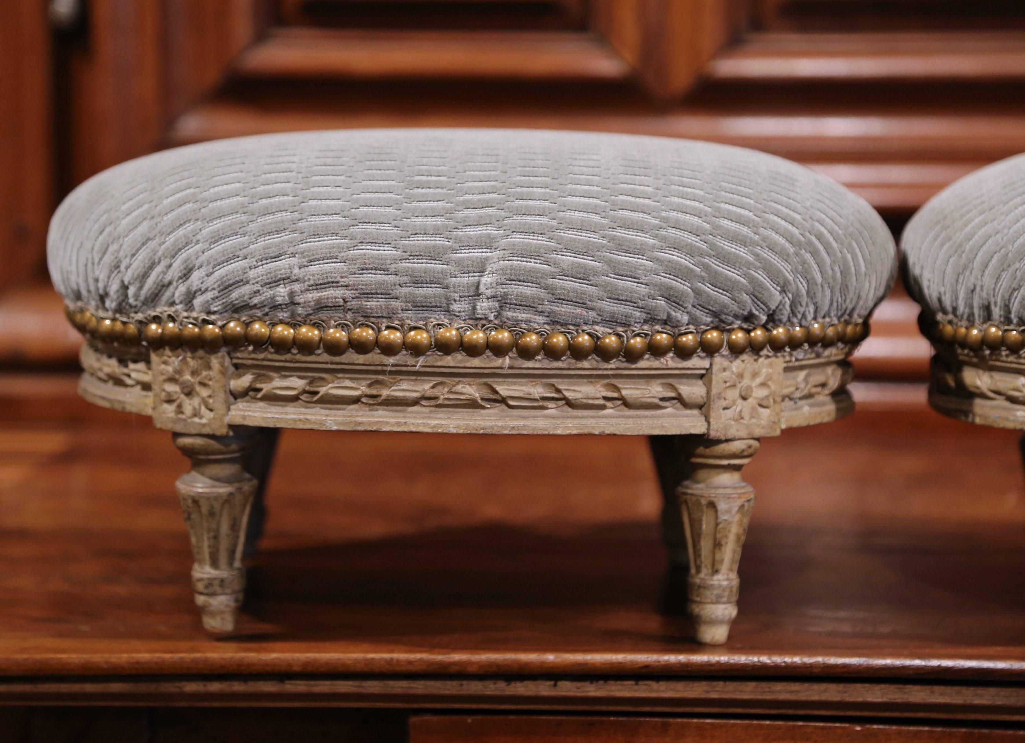 Hand-Carved Pair of French Louis XVI Carved Painted Oval Footstools with Blue Velvet Fabric
