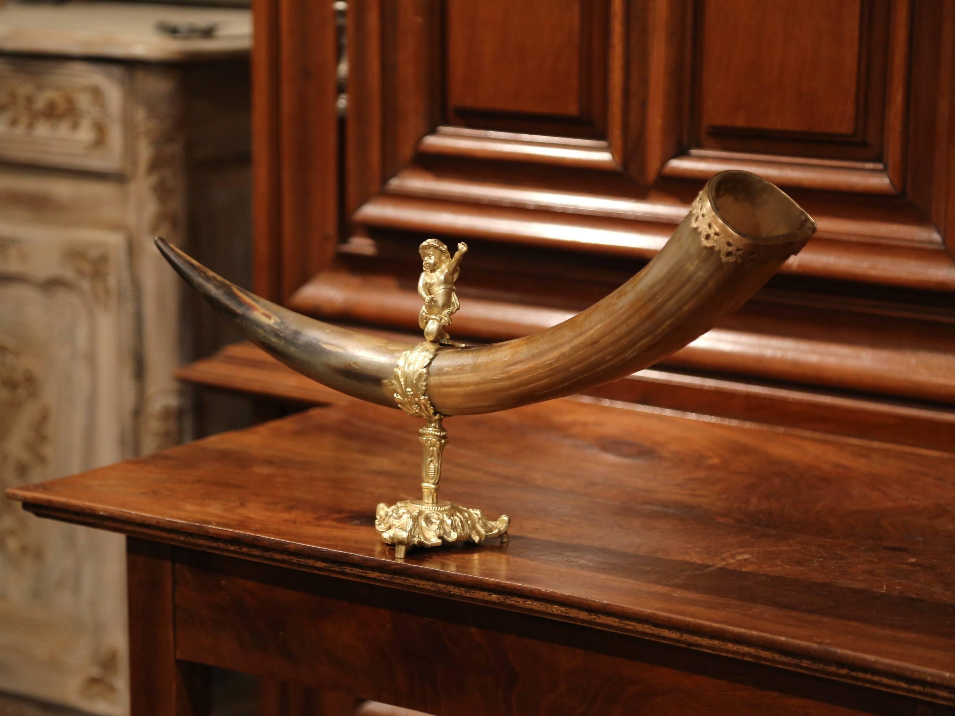 Display this antique drinking Horn in your office or on a shelf. Crafted in France, circa 1860, the Horn of plenty cornucopia is mounted on an intricate bronze base, which is wrapped around the Horn with decorative bronze acanthus leaves. The Horn