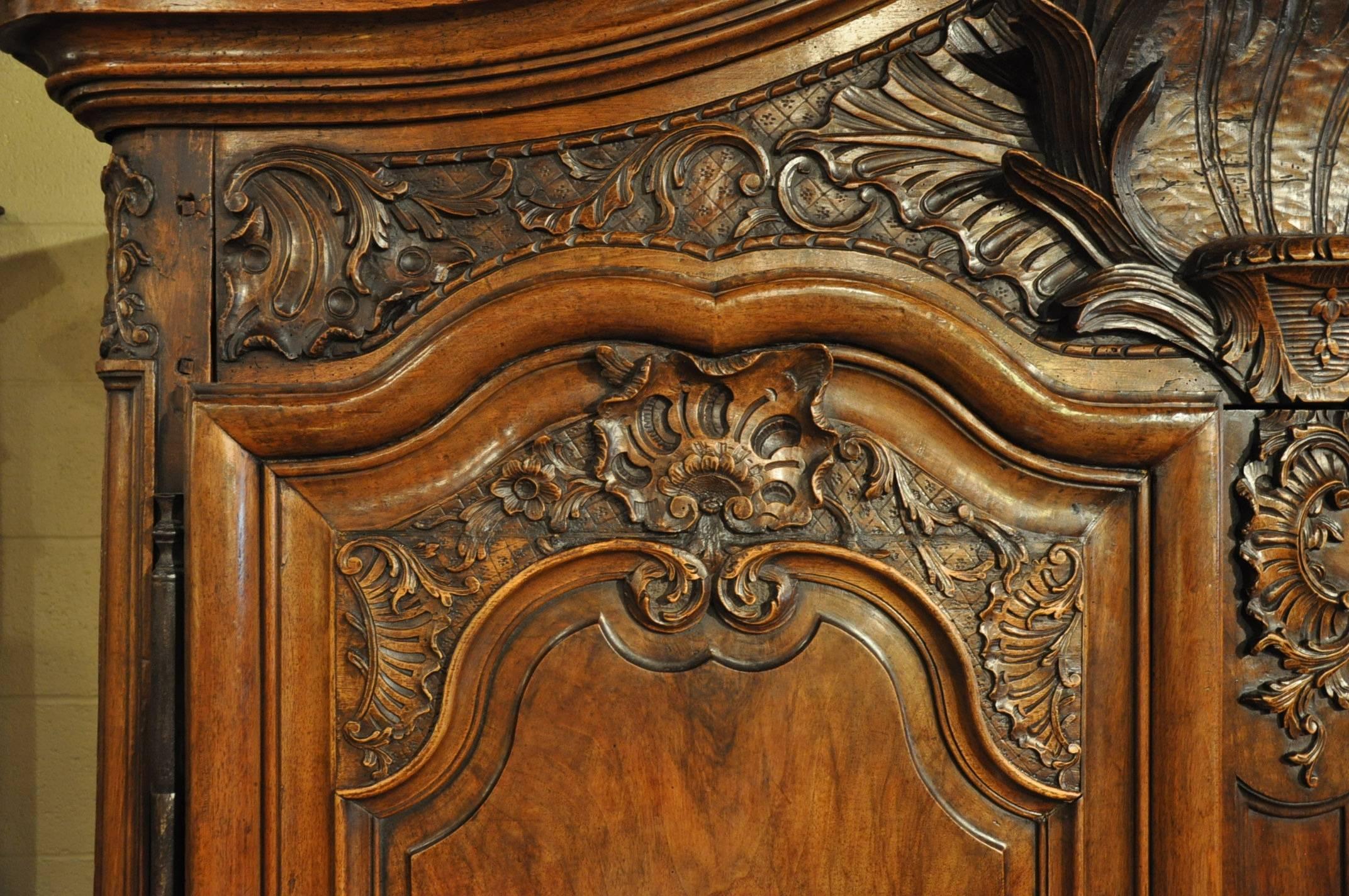 18th Century Country French Louis XV Carved Walnut Armoire from Lyon 3