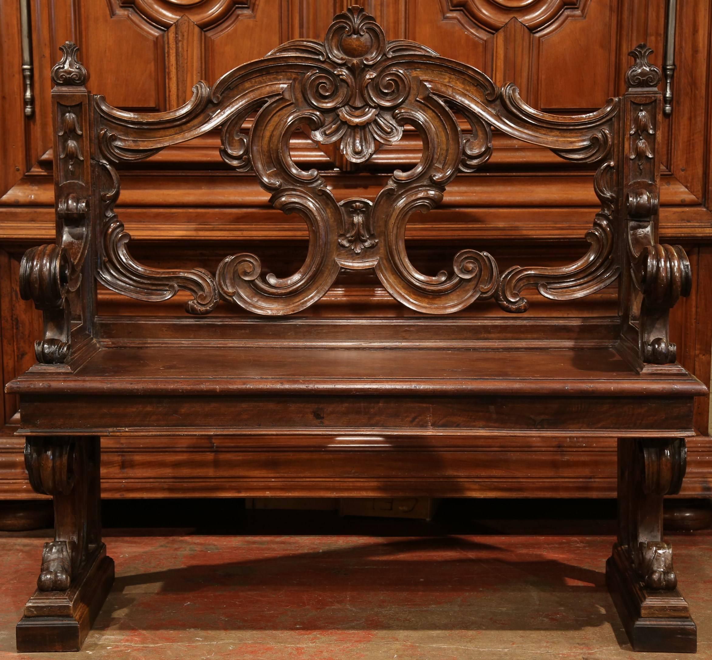 For a decorative, beautiful seating option, consider this elegant antique bench from Italy. Made circa 1810, this hand-carved fruitwood bench would make a perfect addition to an entryway, or placed in front of a window, or at the foot of a bed. This