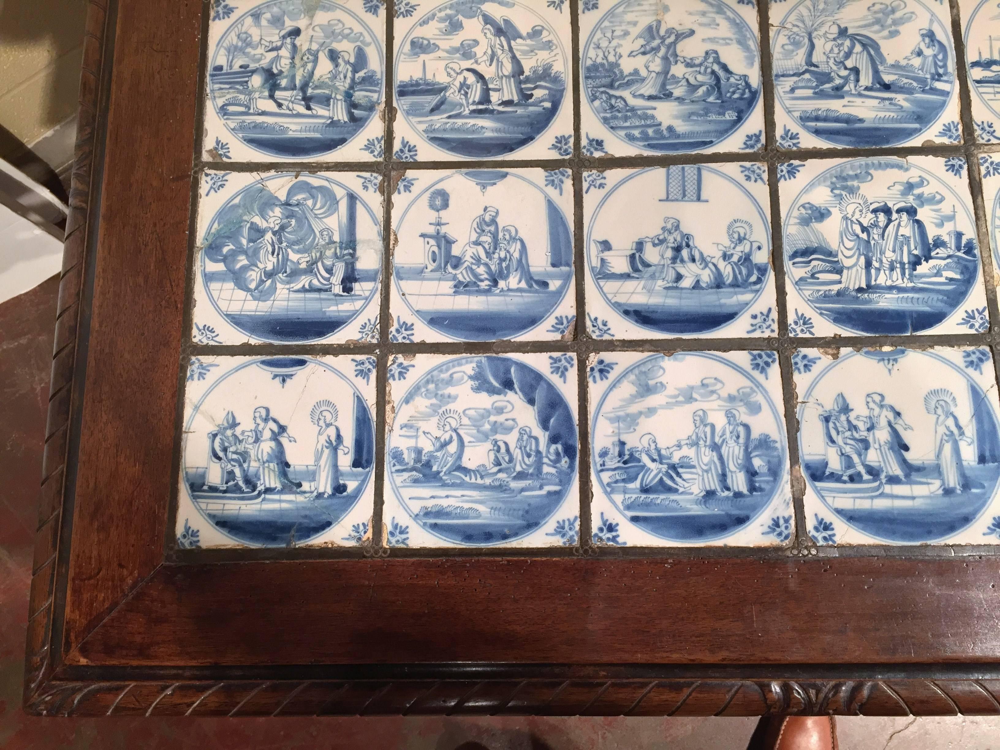 Hand-Carved 19th Century Walnut Table with 32 Blue and White Delft Biblical Scenes Tiles
