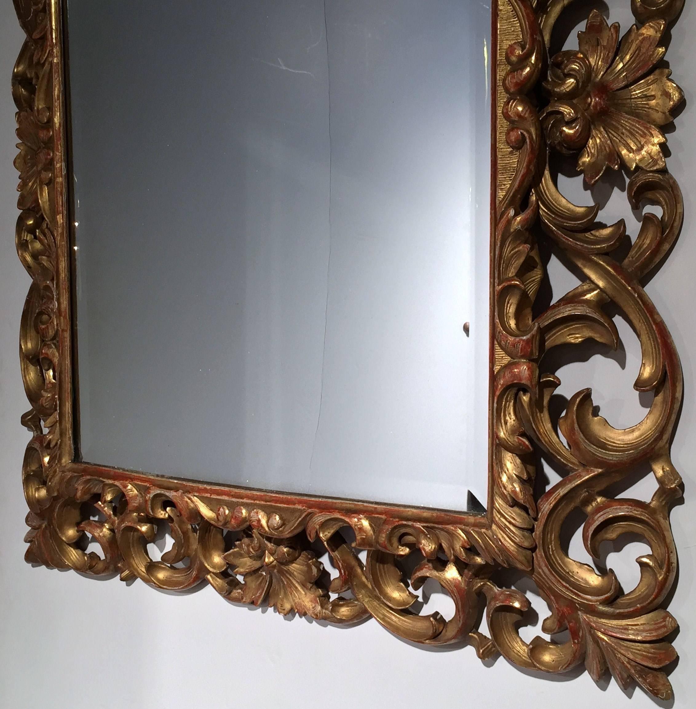Rococo 19th Century French Napoleon III Carved Giltwood Mirror with Scroll & Leaf Decor