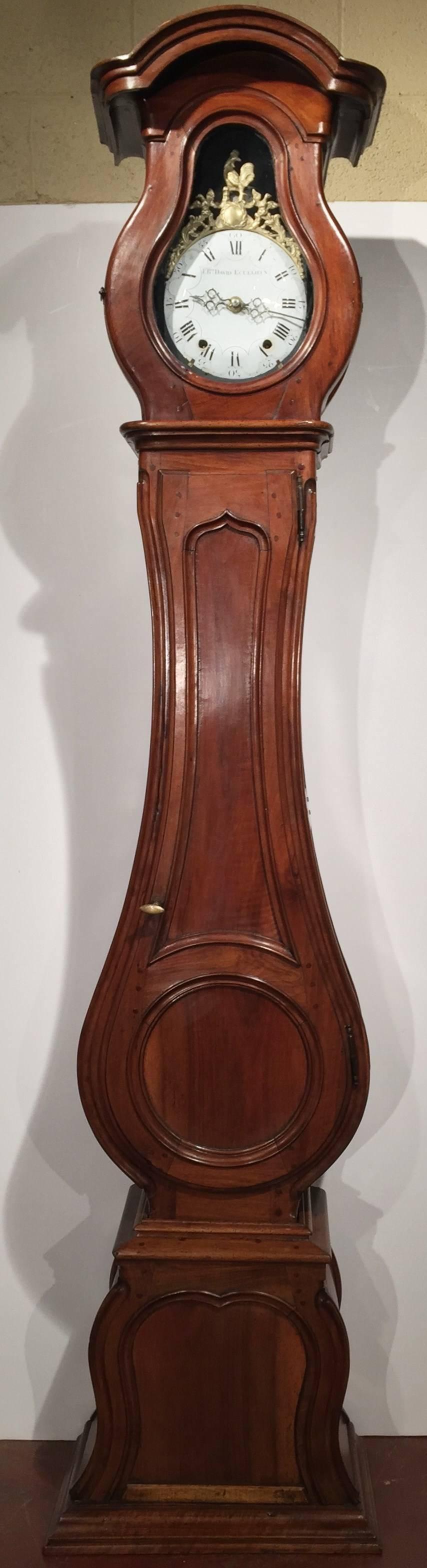 Elegant antique long case grandfather clock from Lyon, France, circa 1760. The rooster movement has been cleaned up and revised and is in fine working condition, keeping great time and striking on the hour and half hour! Beautiful patina!