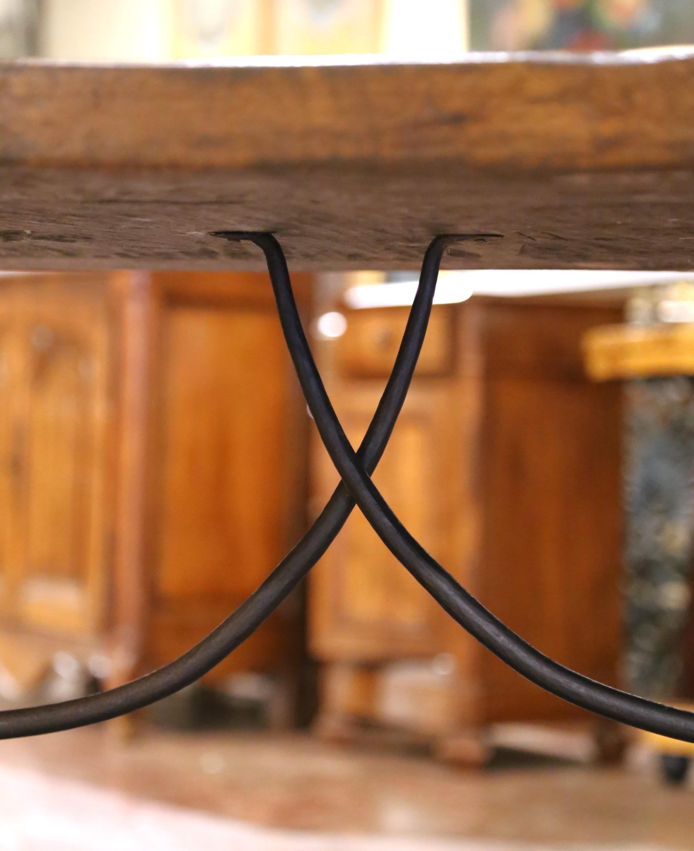 Wrought Iron 19th Century Spanish Carved Walnut Dining Trestle Table with Single Plank Top For Sale