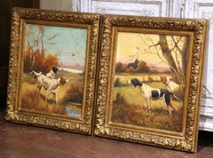 Paire de peintures à l'huile représentant des chiens de chasse européens du XIXe siècle, dans des cadres en bois doré