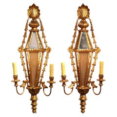 Pair of 19th Century French Louis XVI Giltwood Mirrored Two-Light Sconces