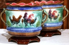 Pair of 19th Century French Painted Ceramic Barbotine Cache Pots with Chicken