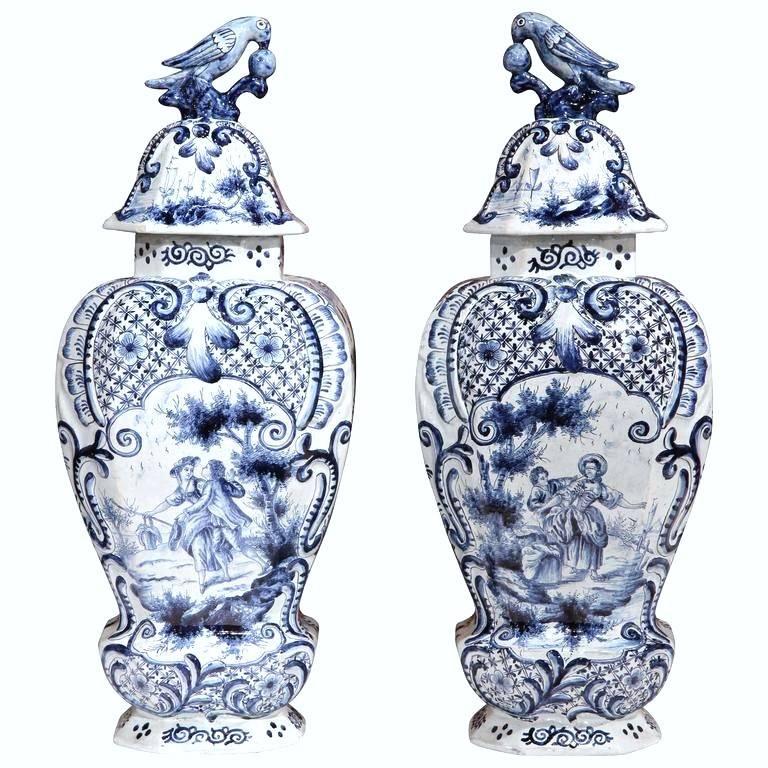 Pair of 19th Century Hand-Painted Blue and White Delft Vases with Lids