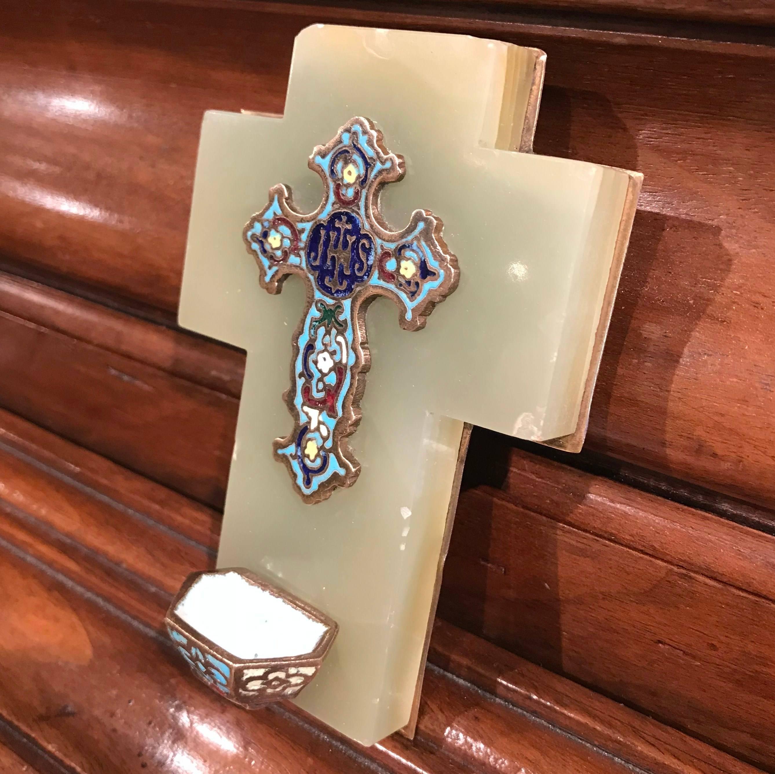 This marble and cloisonné cross with a holy water recipient was created in France, circa 1880. The beautiful, antique piece has intricate cloisonné work with additional enamel, stone and bronze elements. The embellished cross is set on a simple,