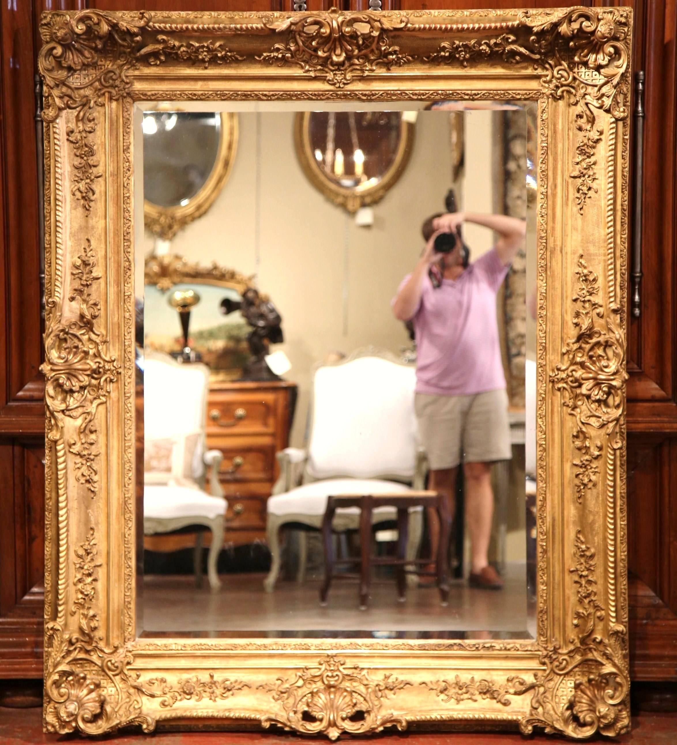 19th Century French Louis XV Carved Giltwood Mirror with Floral and Shell Decor In Excellent Condition In Dallas, TX