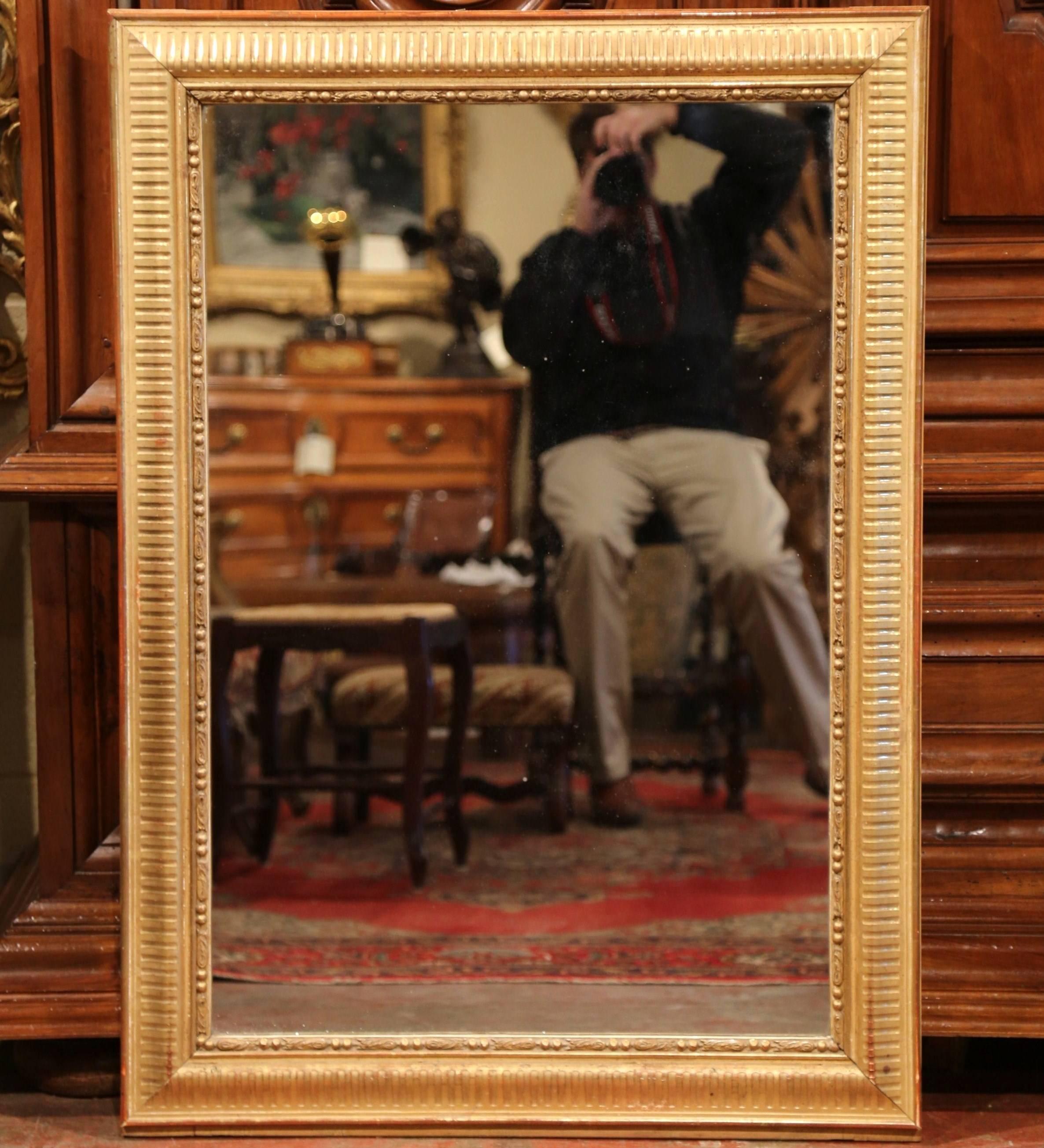 19th Century French Louis XVI Carved Gold Leaf Mirror with Two-Tone Stripe Motif In Excellent Condition In Dallas, TX