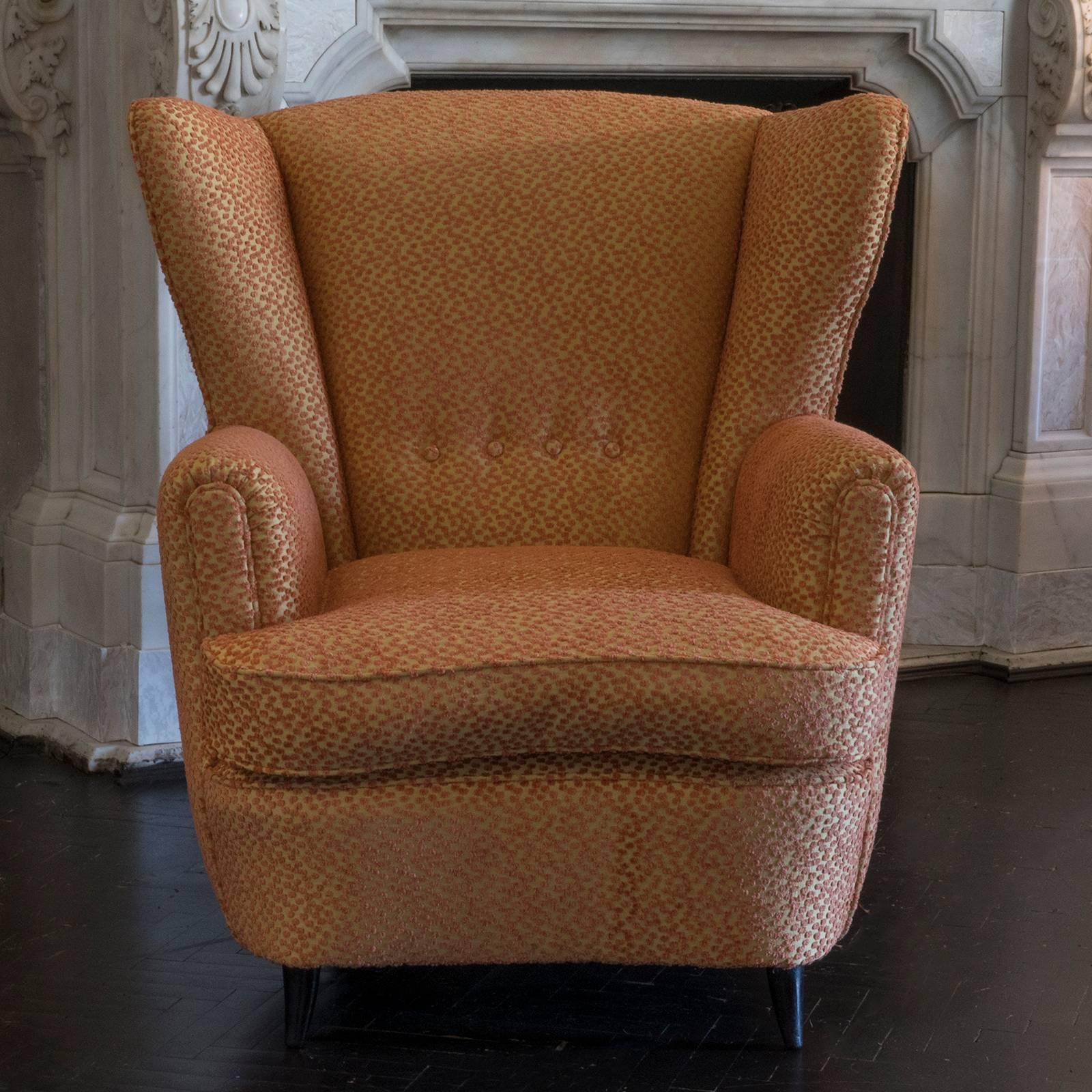 Pair of contemporary armchairs in the style of Paolo Buffa, upholstered in cotton orange polka dot fabric.
