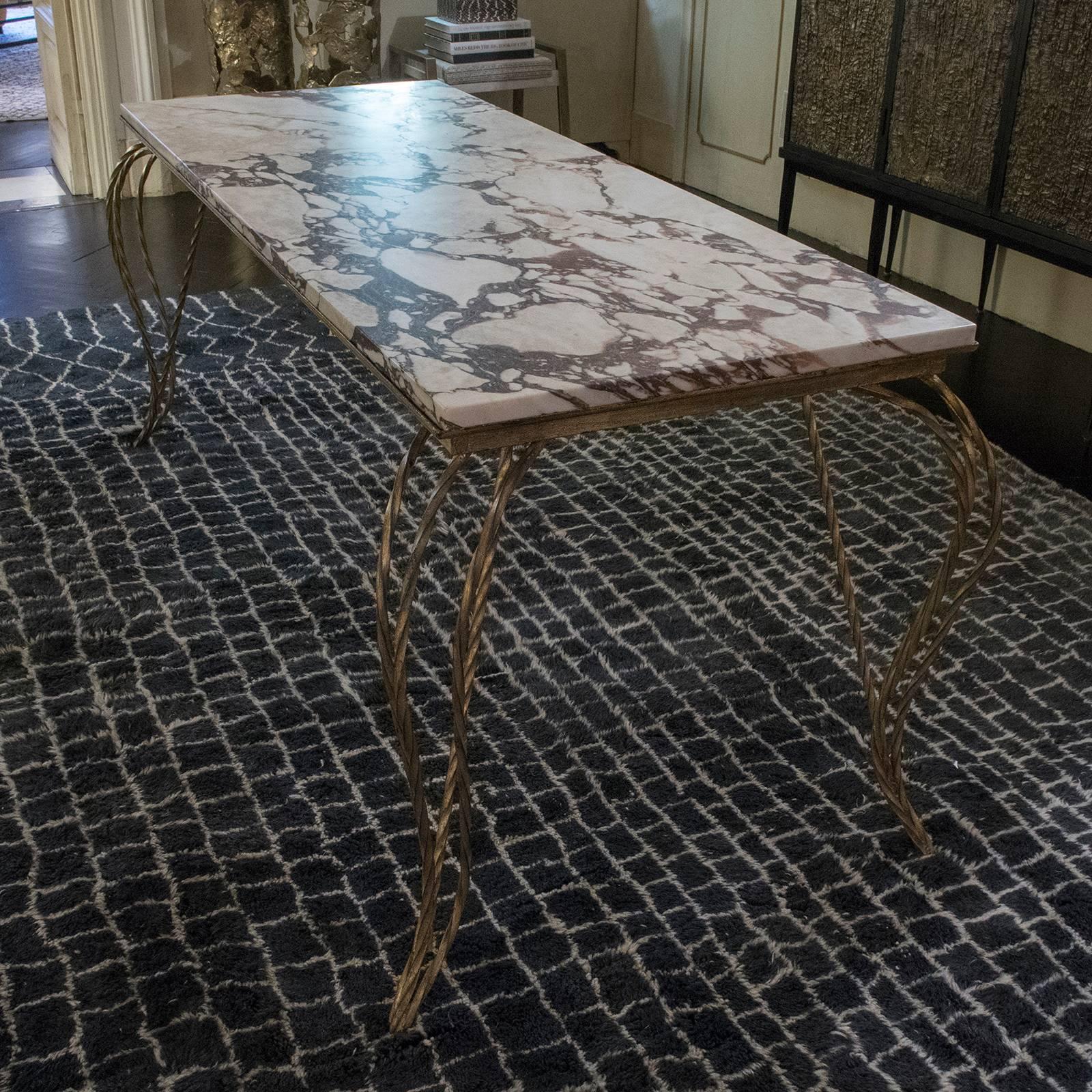 Gold leaf steel structure with original marble top.