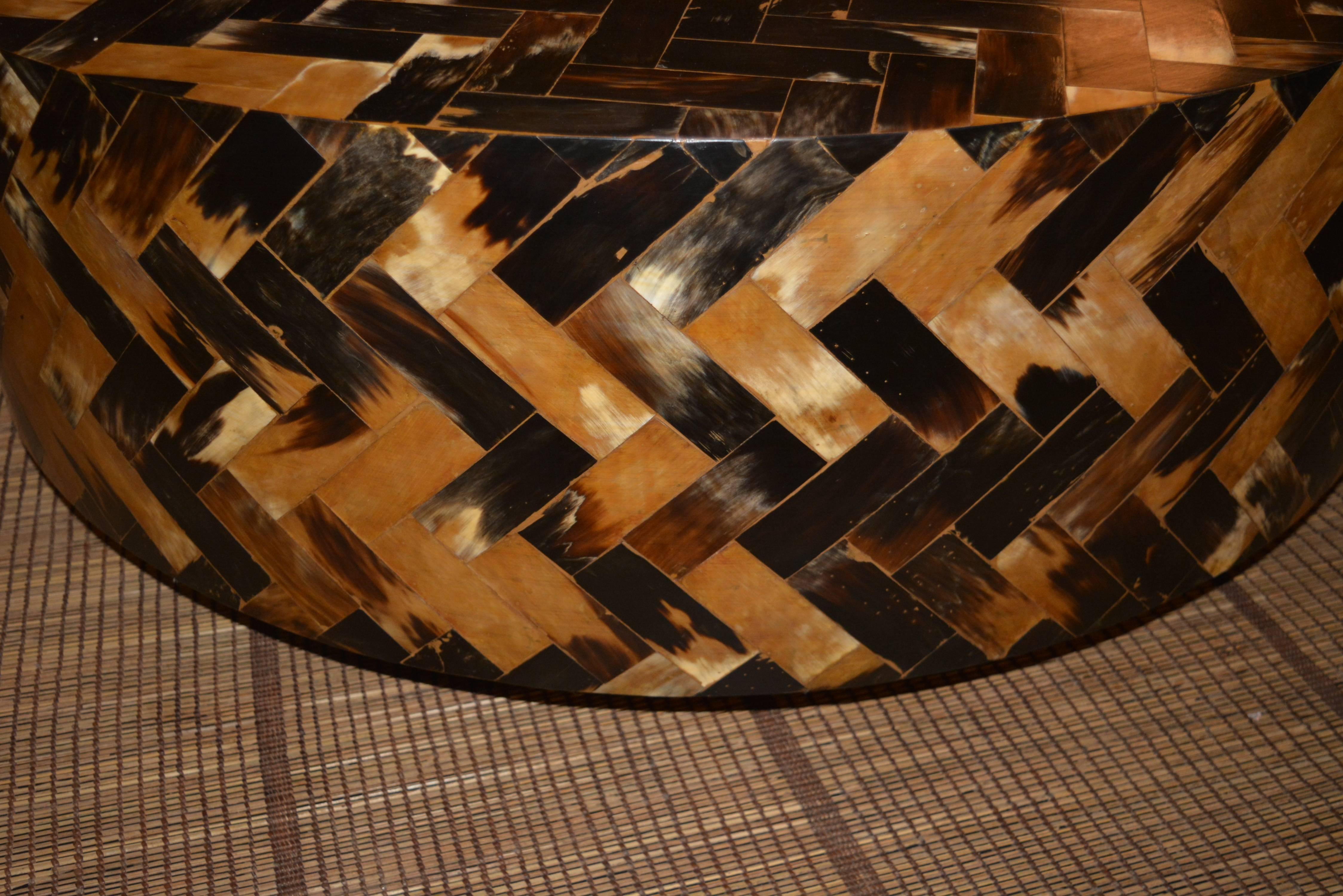 American coffee table made of Horn on a revolving black base.