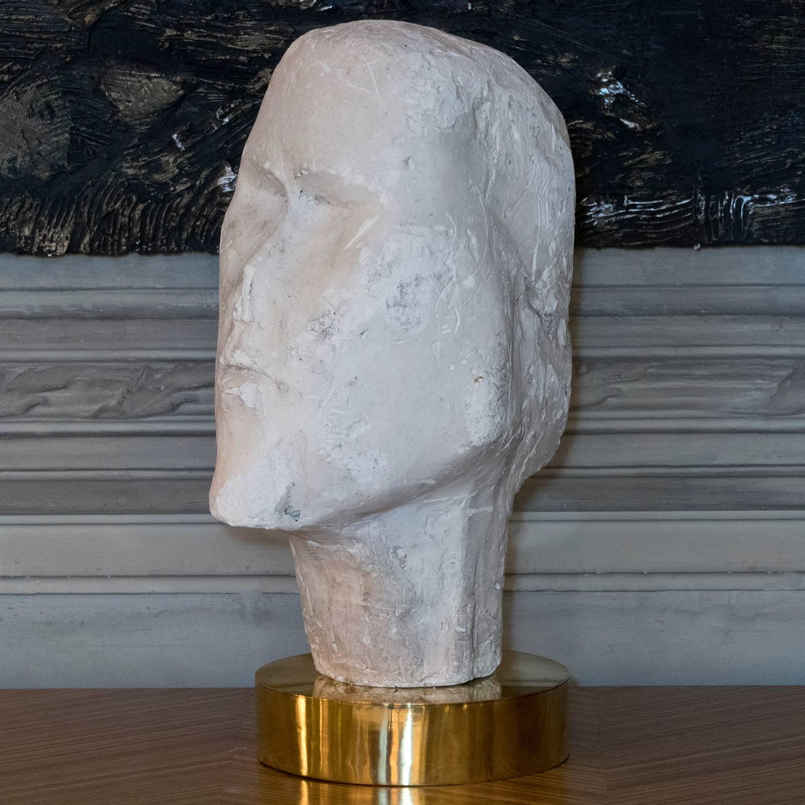 French plaster sculpture in the style of Modigliani, vintage patina, natural brass base, artist unknown.