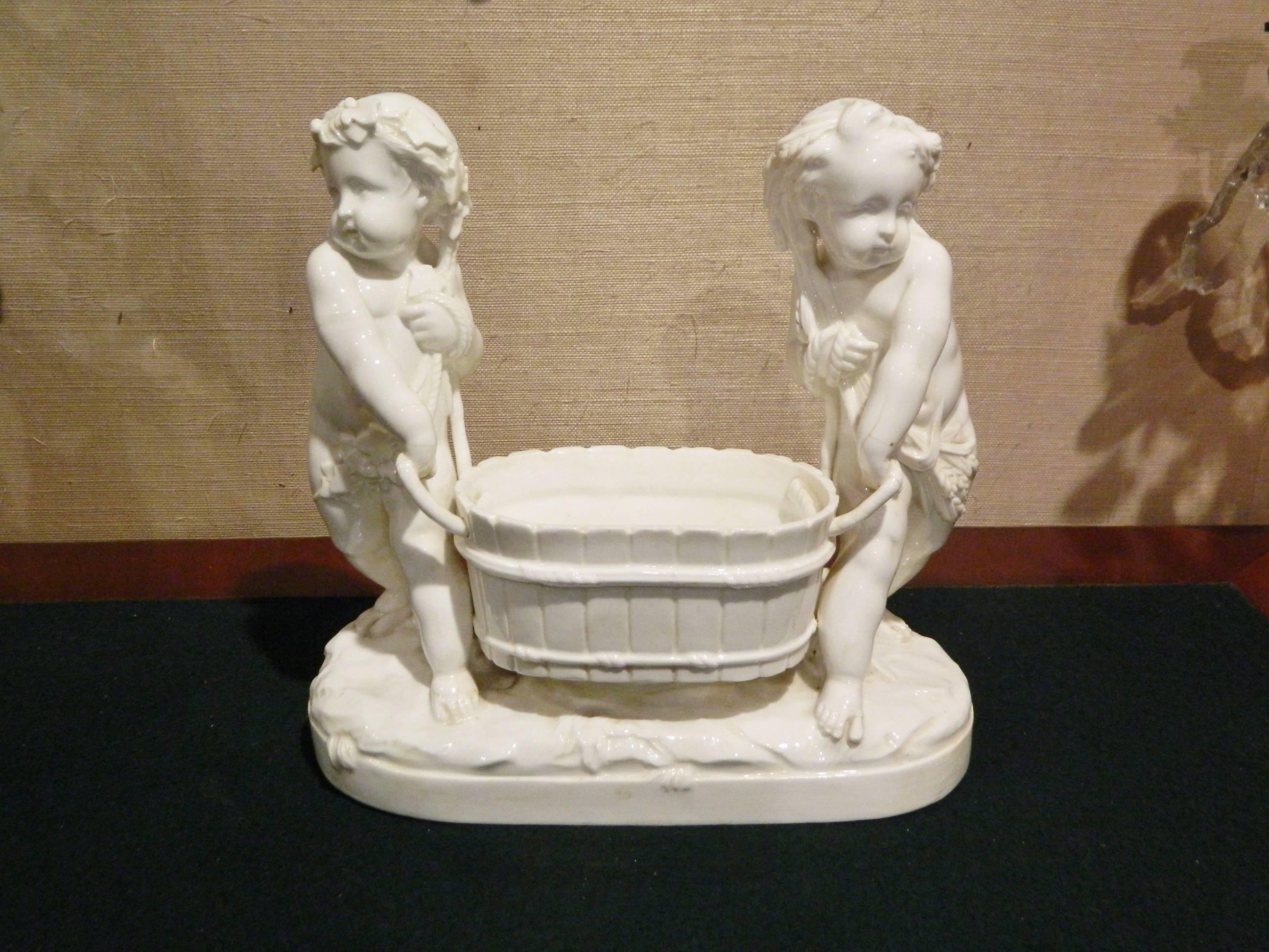 German Porcelain Figural Jardiniere Depicting Putti, 19th-20th Century 1
