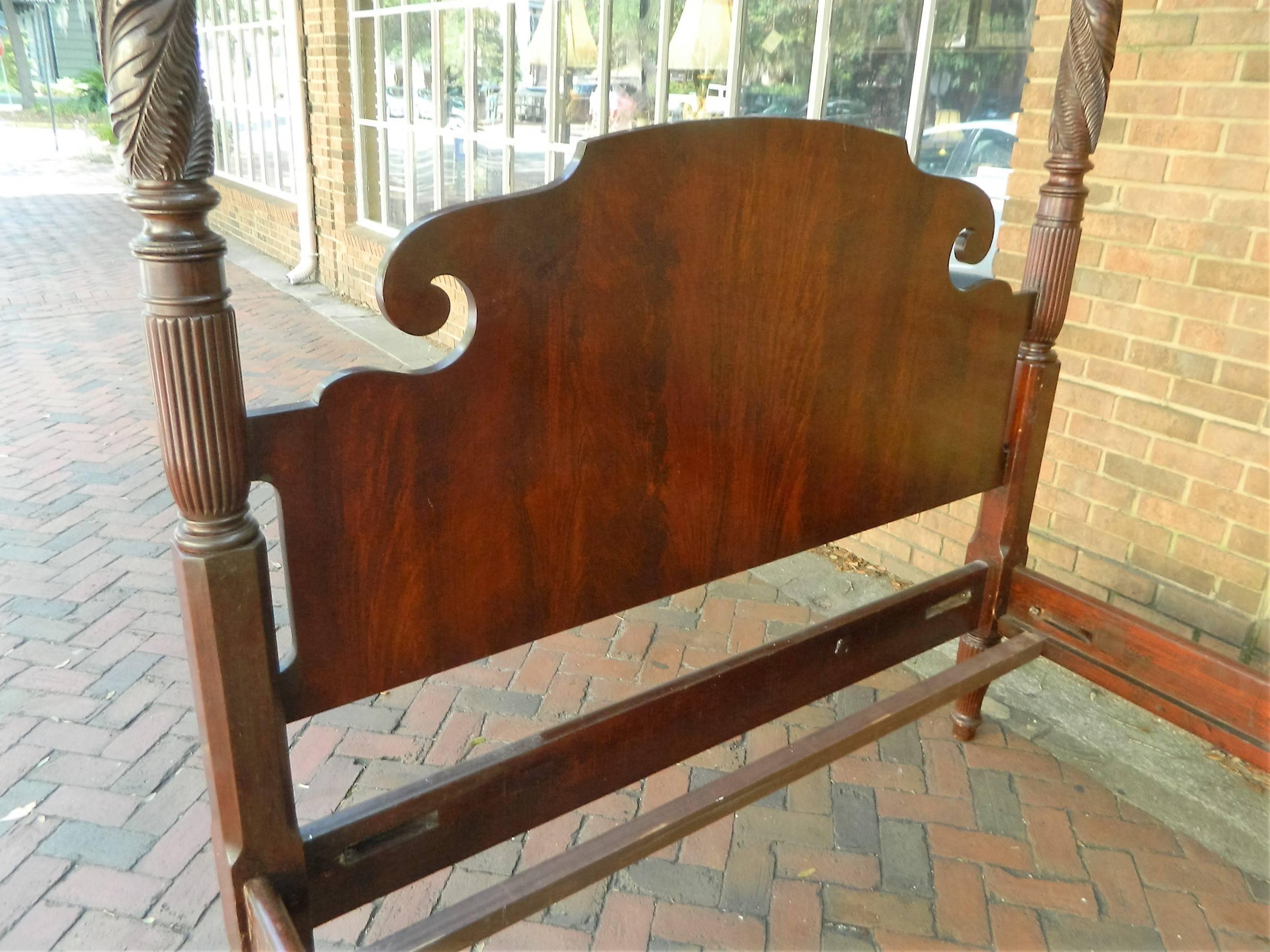 American four-poster queen bed with tobacco leaf carvings, 19th century. Mahogany wood. Bed frame has been professionally extended to accommodate a standard queen box spring and mattress.
                        