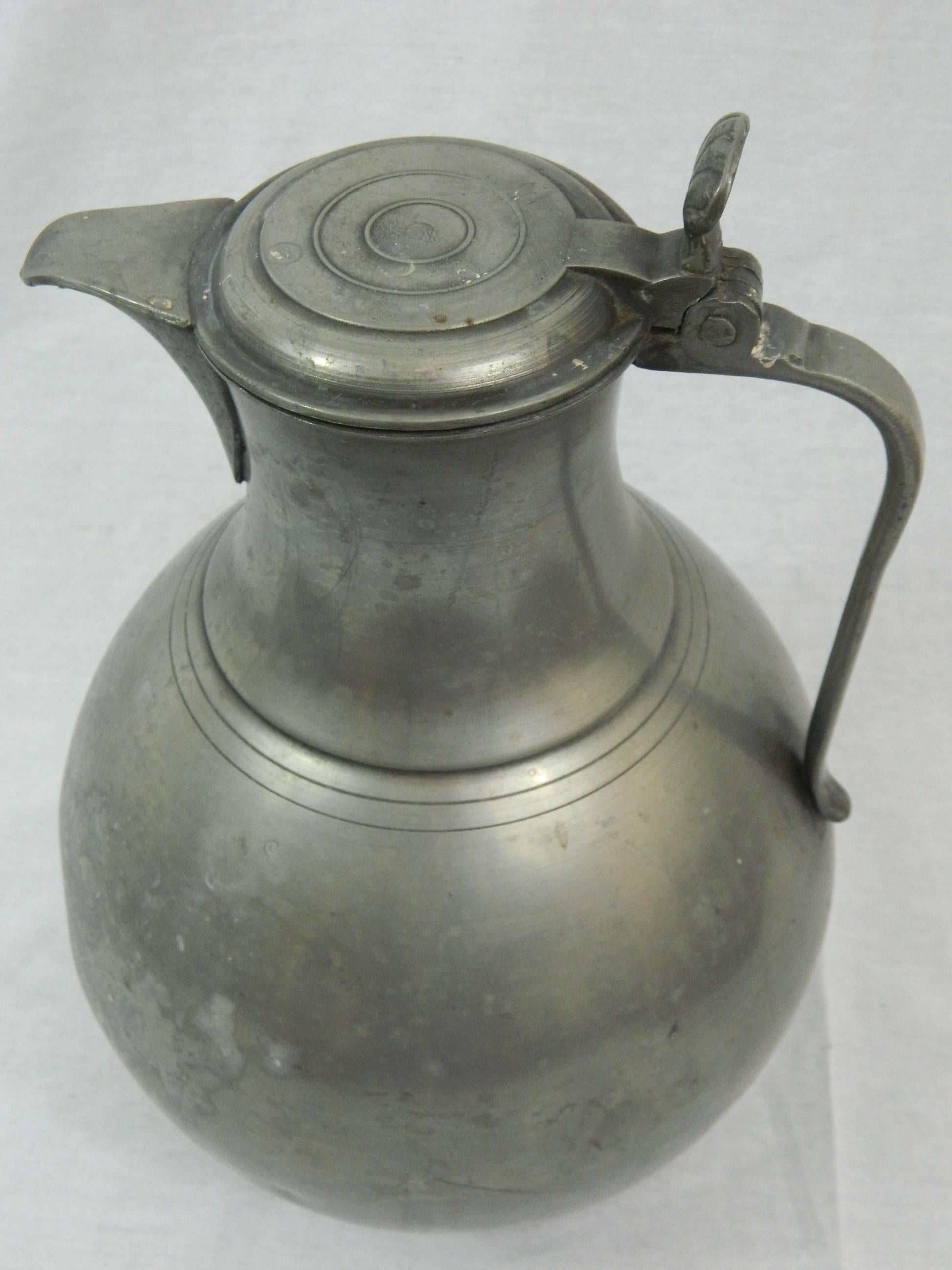 Extra large English pewter tankard or water jug, 18th century.