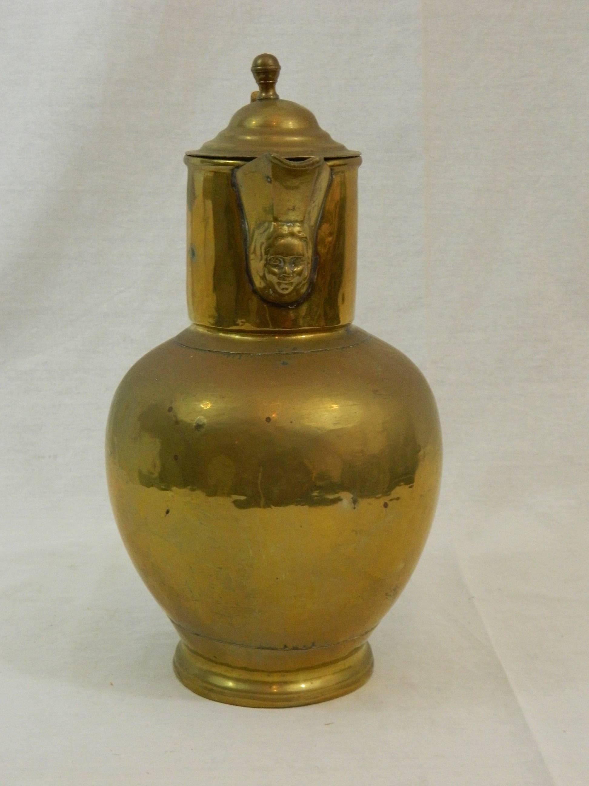 English brass wine jug or pitcher, 19th century.