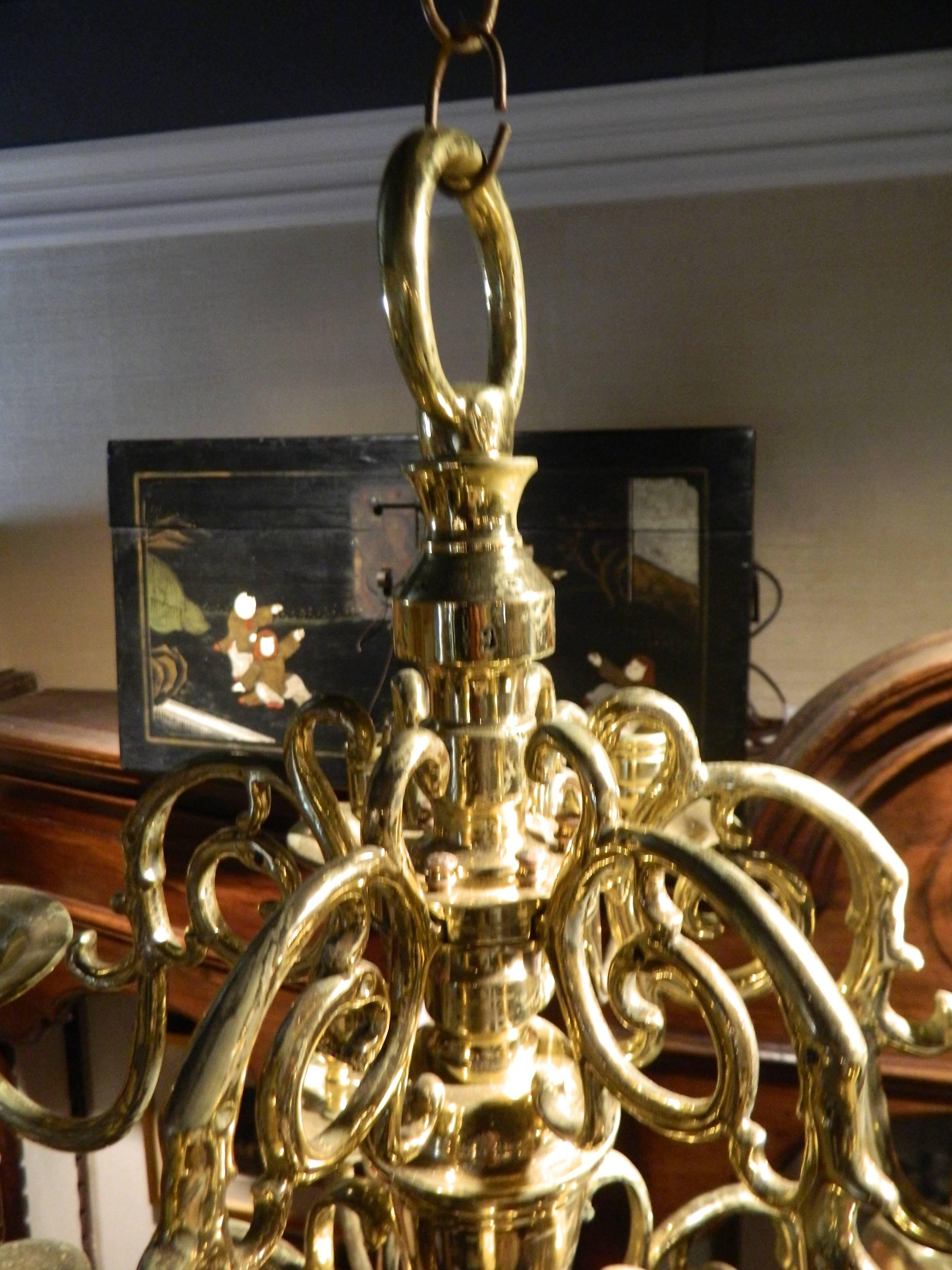 French polished brass two-tier ball chandelier, 19th century. Currently not electrified, but we can electrify it for no additional charge.