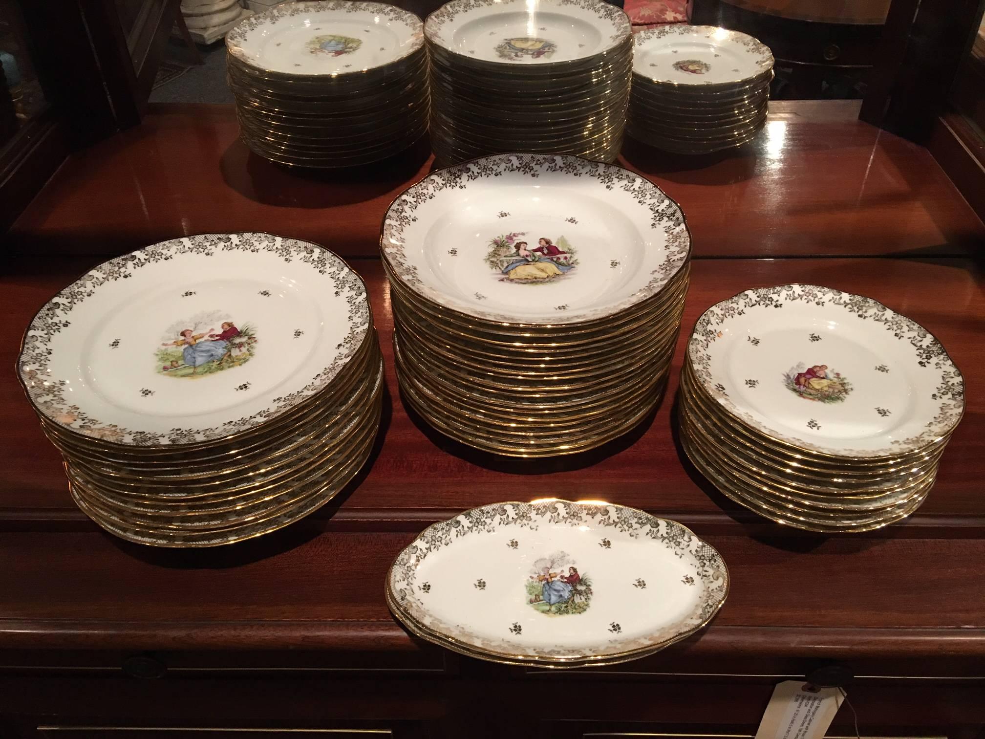 French Veritable Porcelain Dinnerware with Gold Scrolls, Landscape and People 1