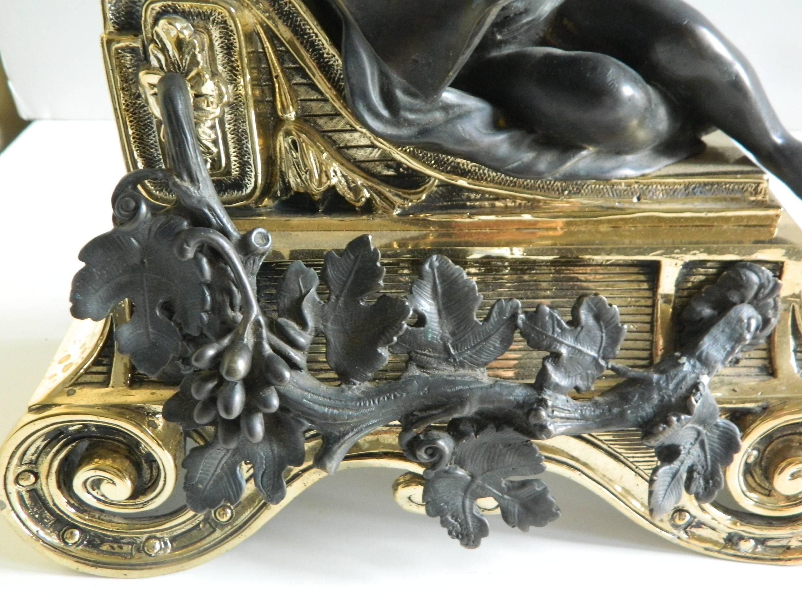 Pair of Polished Brass Chenets or Andirons with Bronze Cherubs, 19th Century In Good Condition For Sale In Savannah, GA