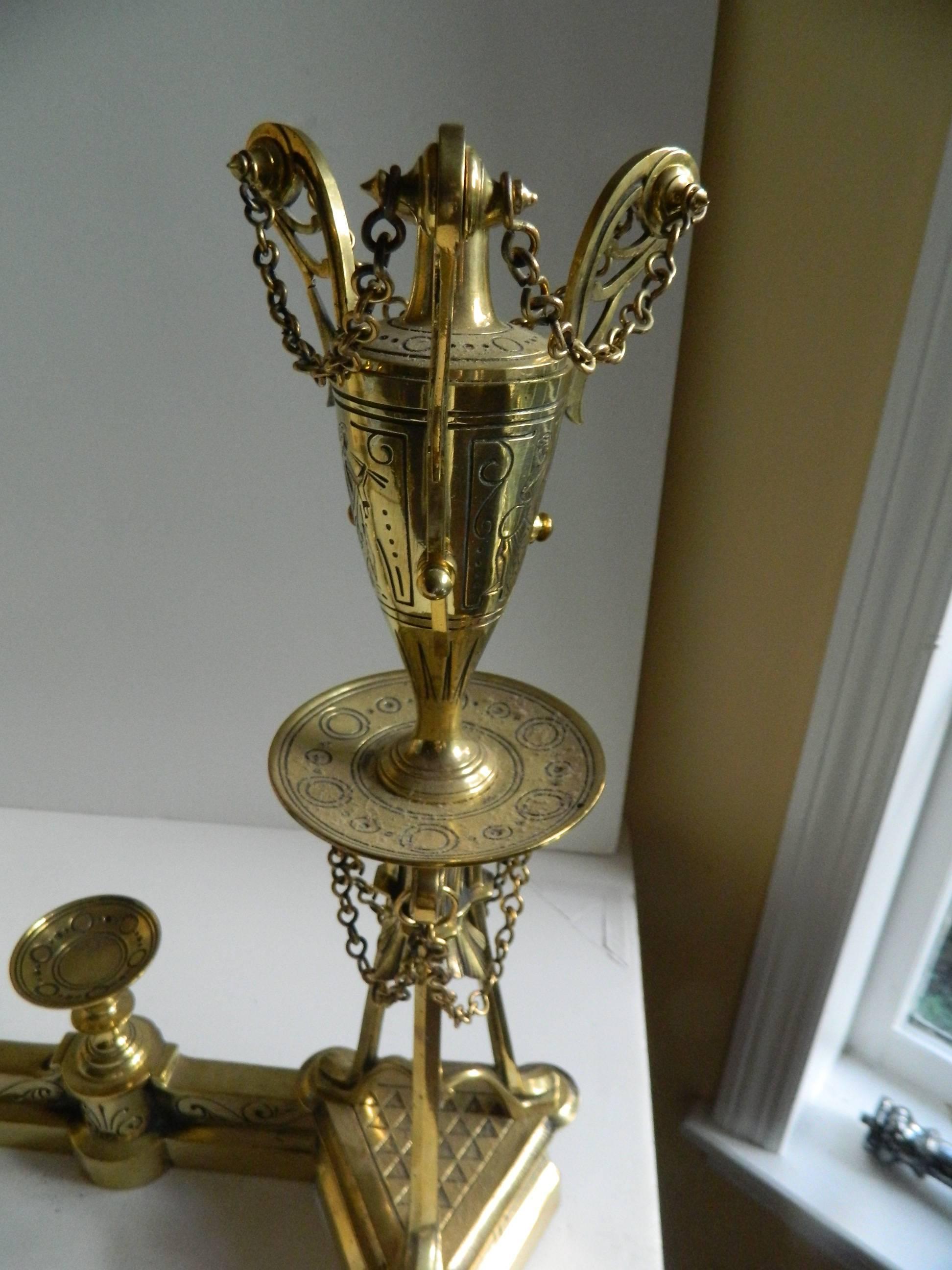 French Pair of Polished Brass Chenet or Andirons with a Fender, Urn Motif, 19th Century For Sale