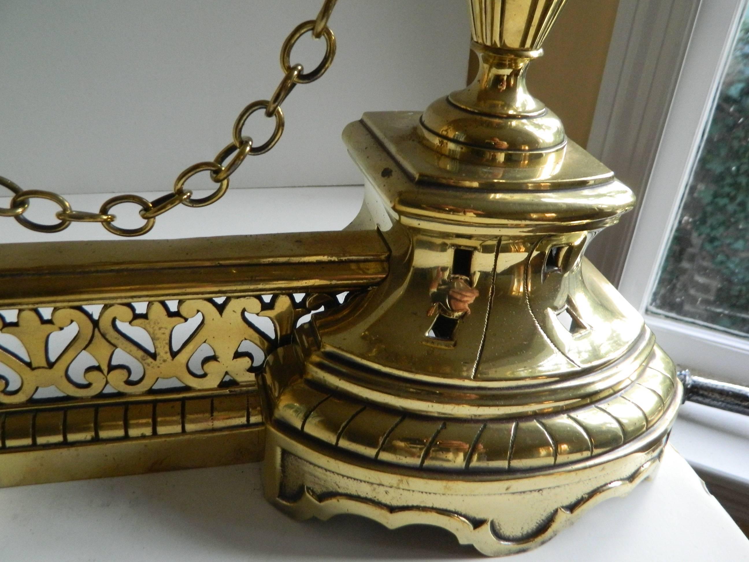 19th Century Pair of Polished Brass Chenets or Andirons with a Fender, Large and Small Urns For Sale