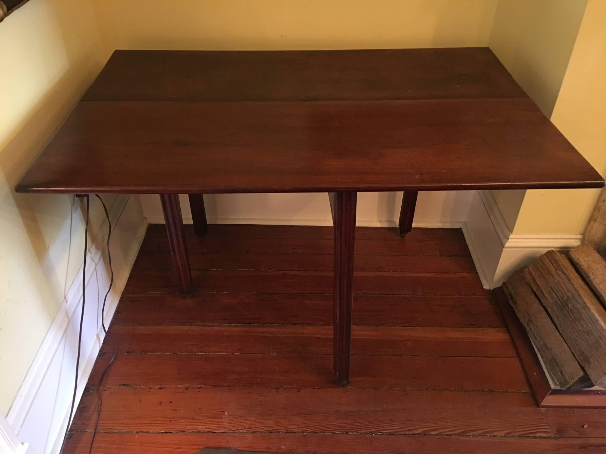 American Mahogany Drop Leaf Table, 19th Century.  Dimensions fully open 43.5