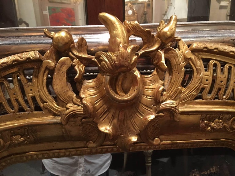 French Louis XV Style Giltwood Overmantel Mirror, Early 19th Century For Sale