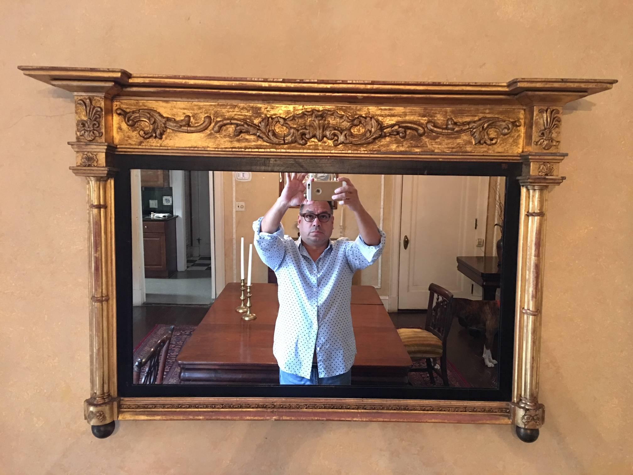 American federal over mantel mirror, 19th century. Greek Roman style with columns on each side.