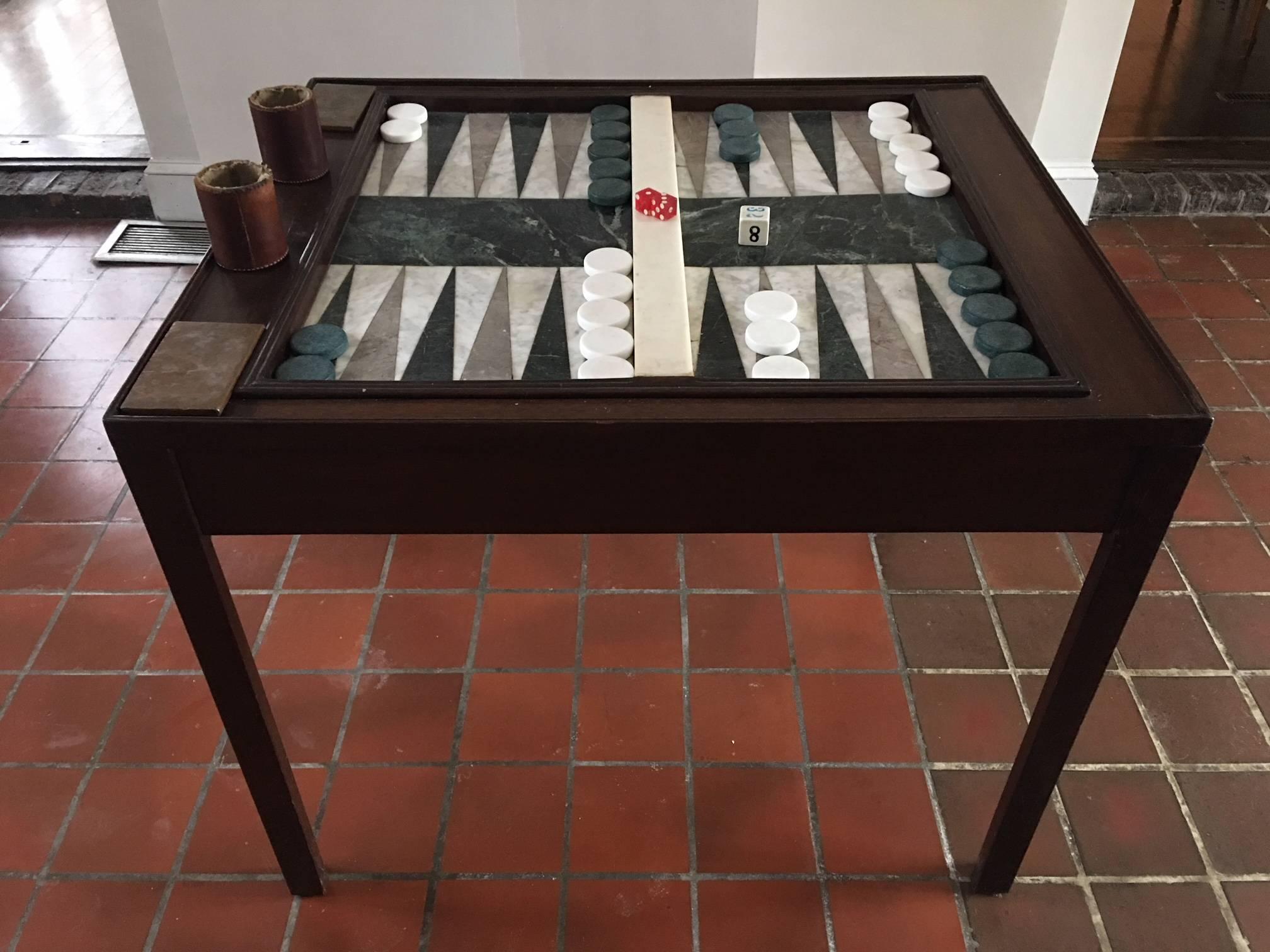 Custom-made Chippendale style mahogany marble backgammon table, late 20th century. Set includes cups, stones and dice.