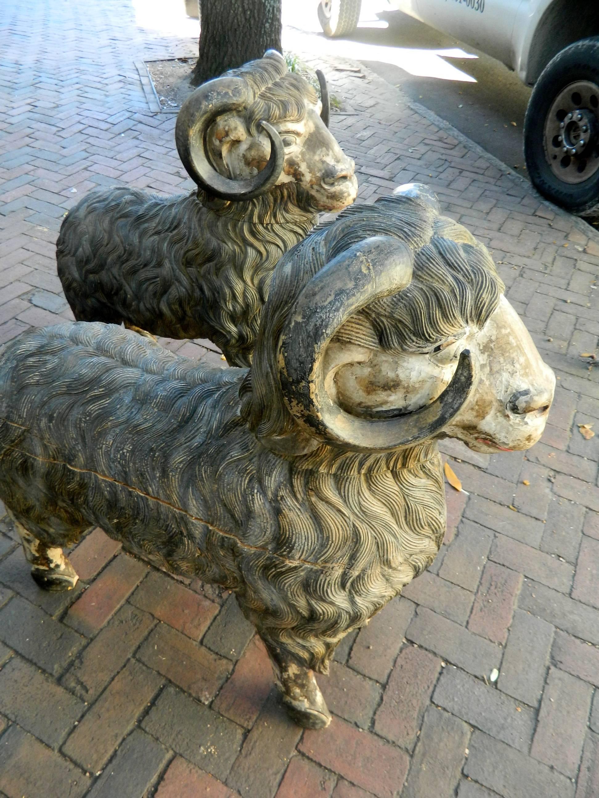 Monumental Size Pair of Balinese Carved Wood Rams, Early 20th Century In Distressed Condition In Savannah, GA