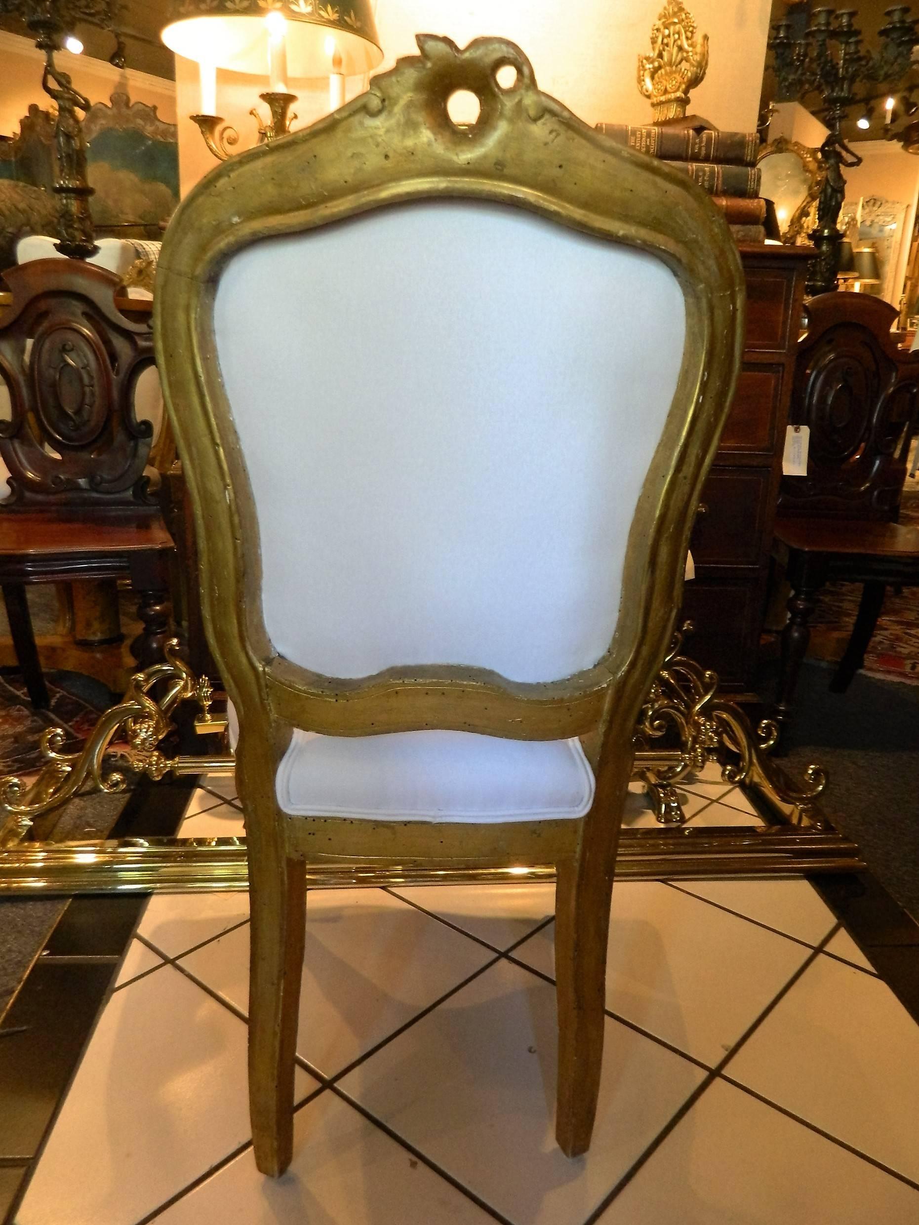 French Set of Eight Louis XV Style Giltwood Side Chairs, Early 19th Century