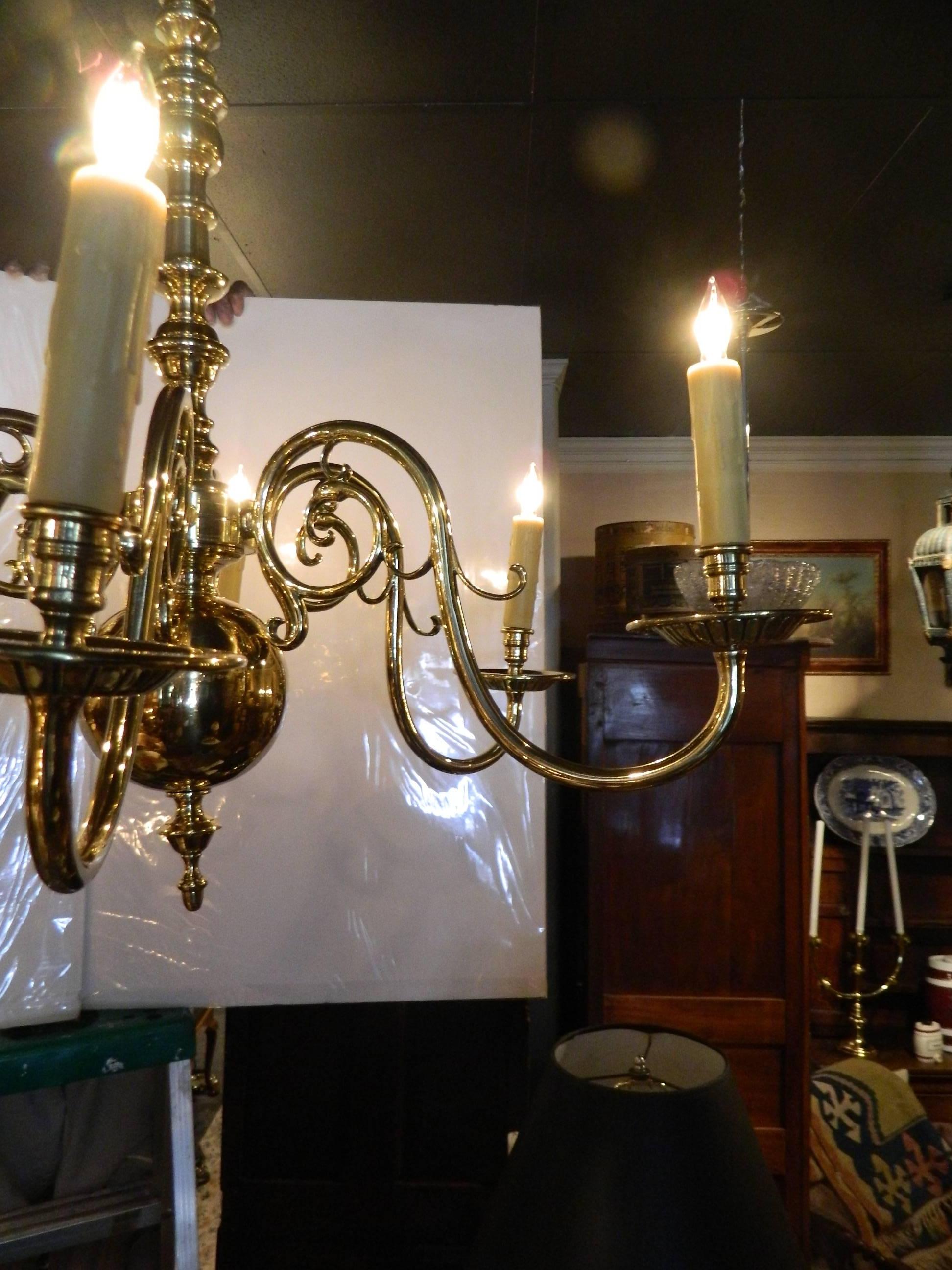 Dutch Style polished brass six-light chandelier, 19th century. US wired. Poly wax sleeves.