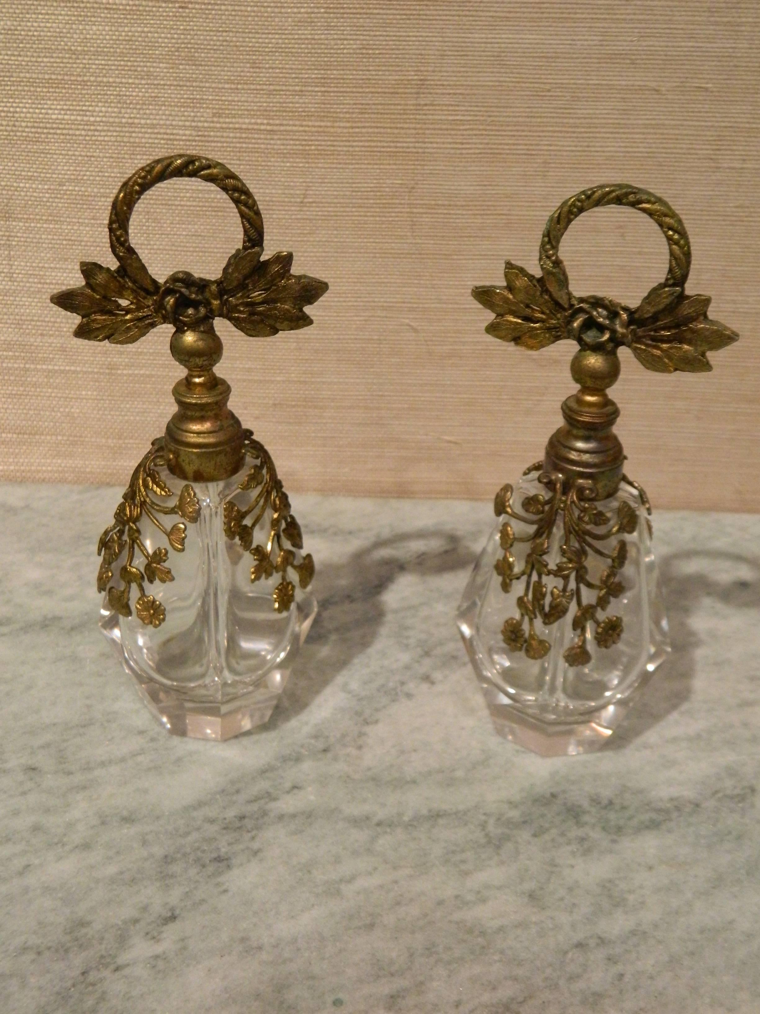 Pair of crystal and bronze doré perfume bottles, 18th century.
   