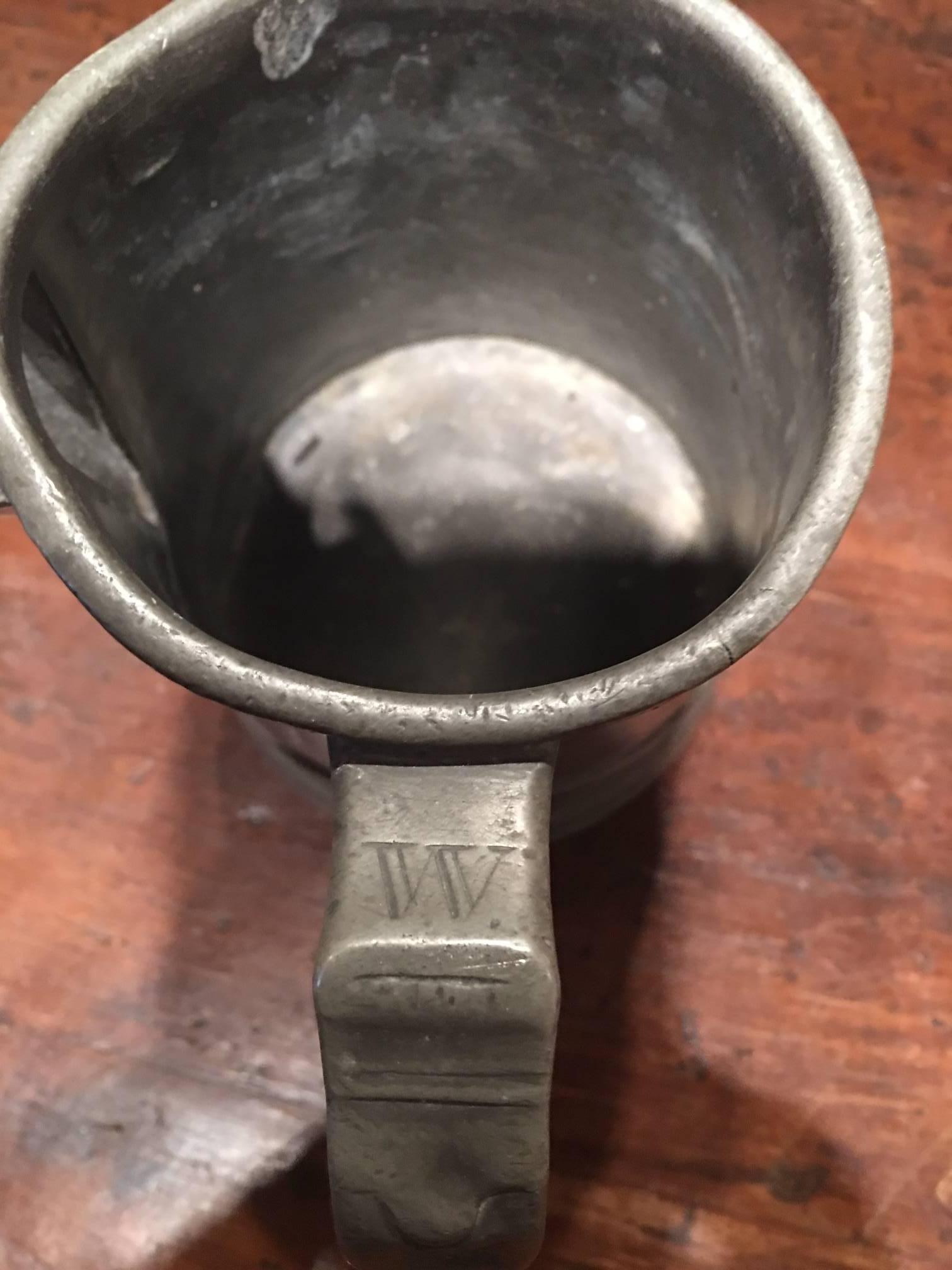 18th century English pewter mug or cup with handle. Measures: 5.5
