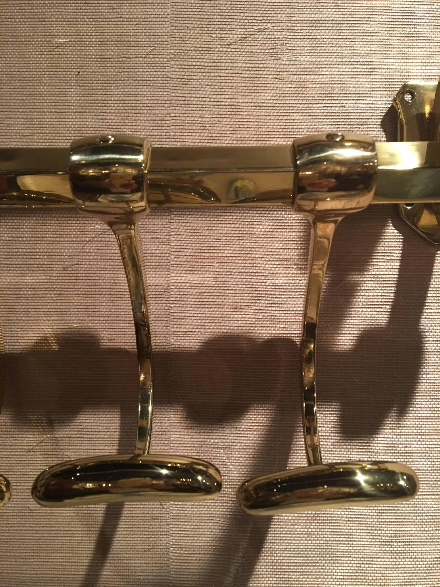 brass coat rack wall