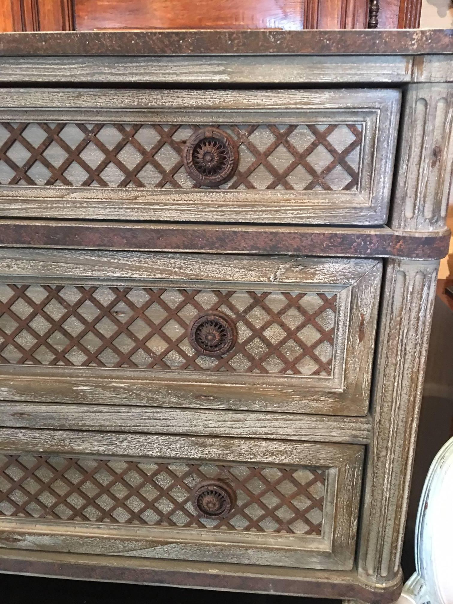French painted three drawer commode or dresser with metal grid and edge detailing, mid-20th century.