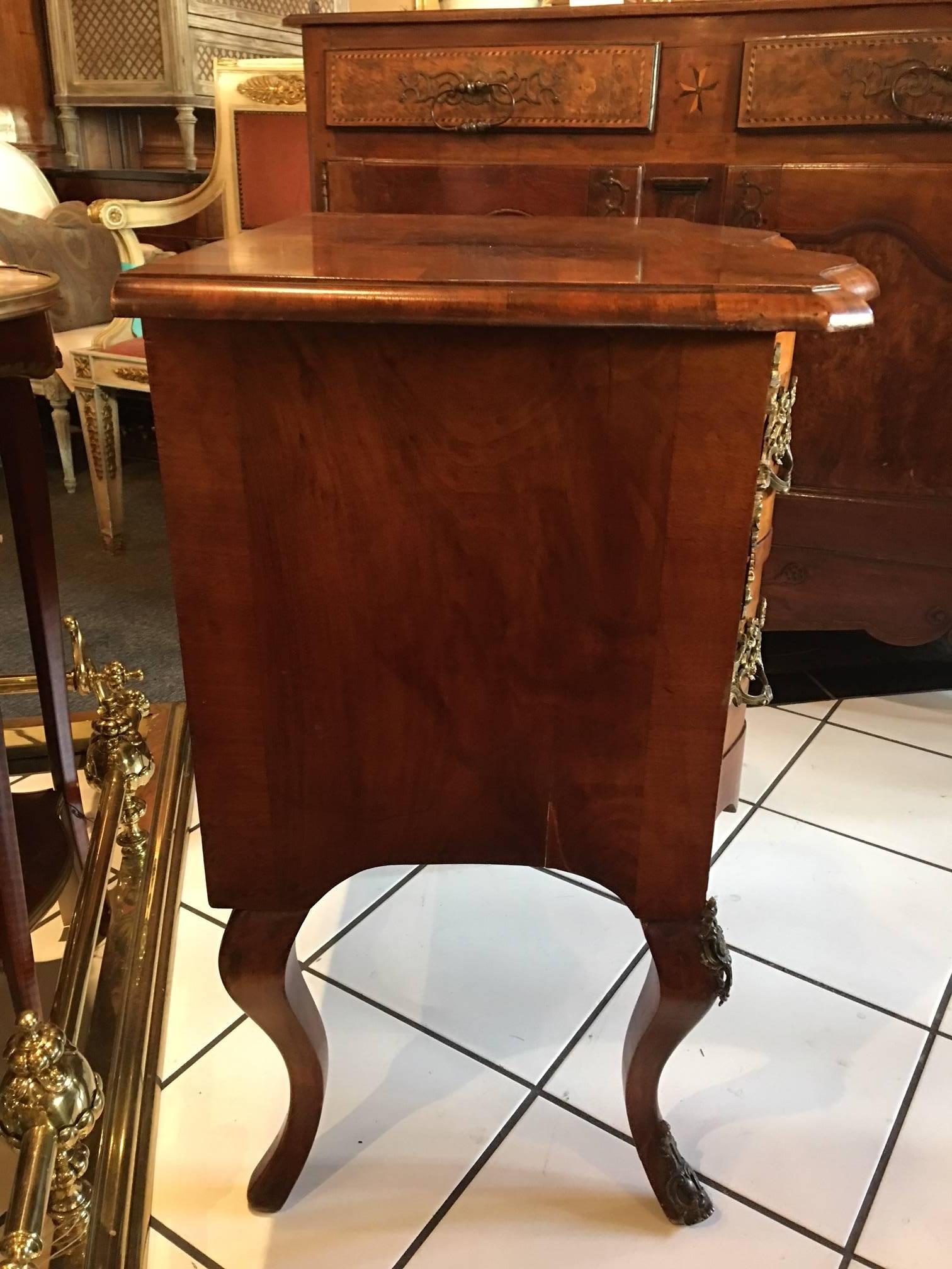 French Continental Figured Walnut and Gilt Metal‑Mounted Petite Commode, 19th Century For Sale
