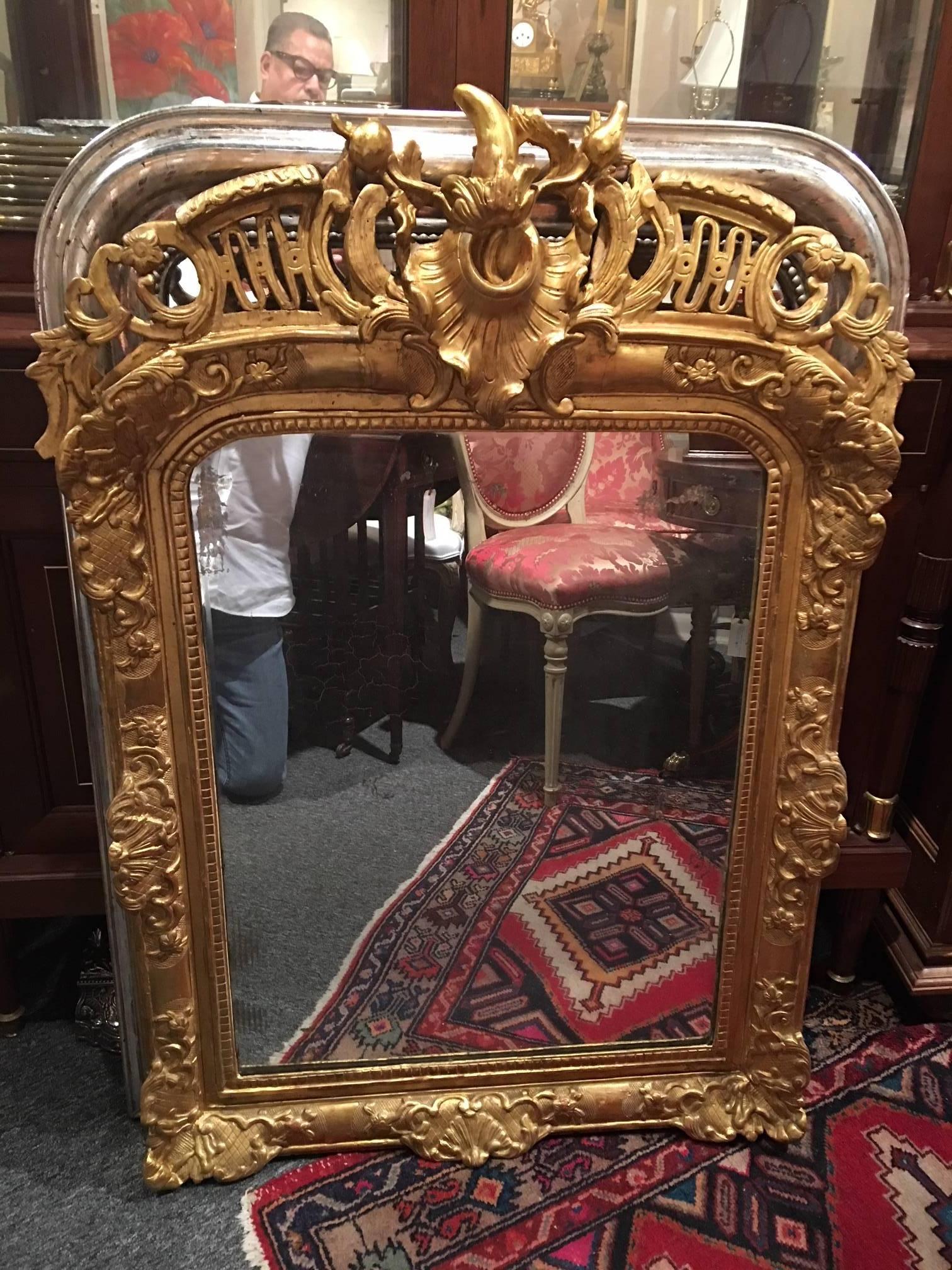 Louis XV style giltwood overmantel mirror, early 19th century.
 