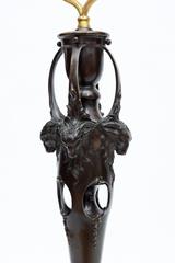 Lamp Decorated with Four Ram’s Heads